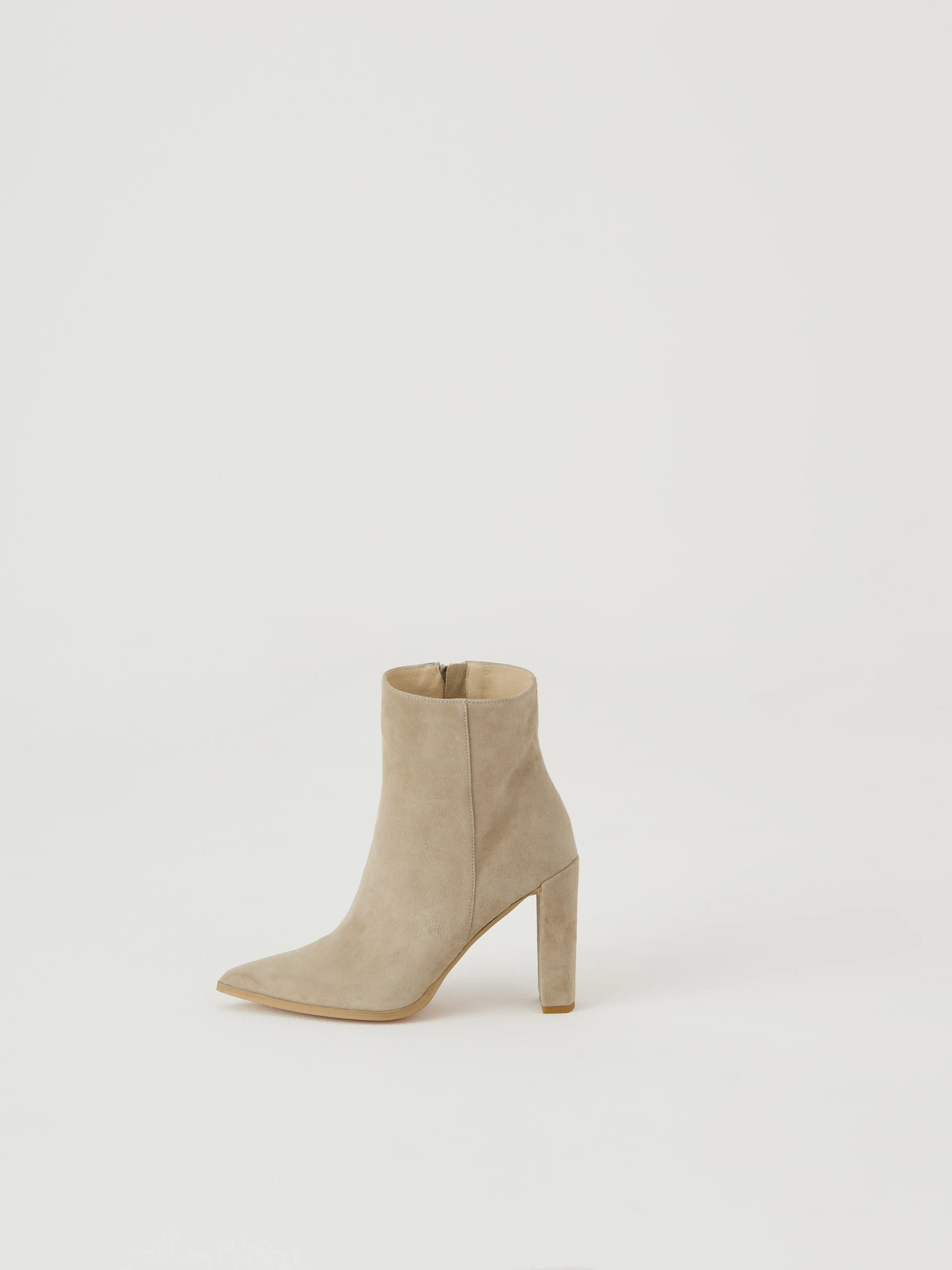 Beige heeled boots