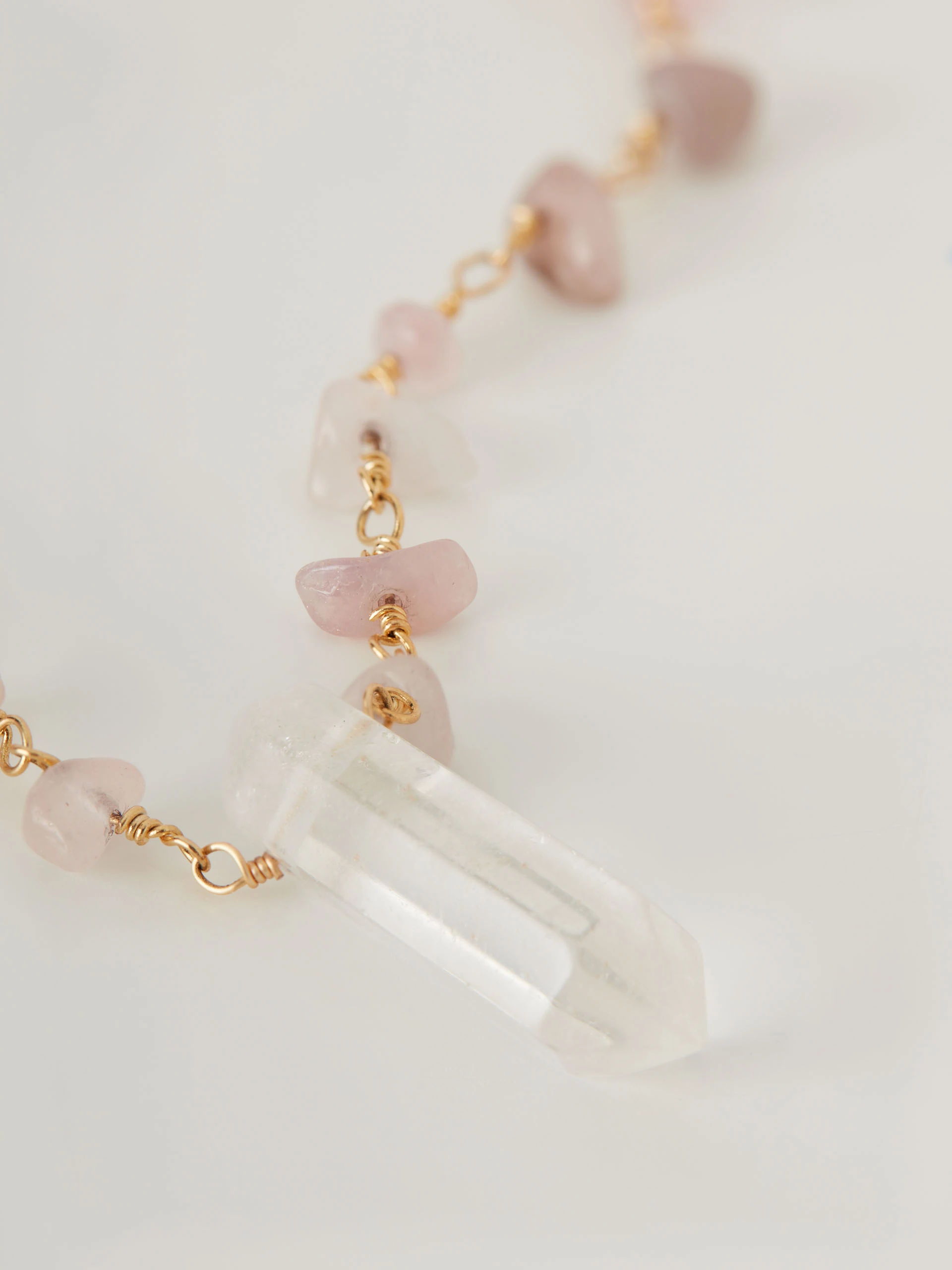 Brass necklace decorated with crystals