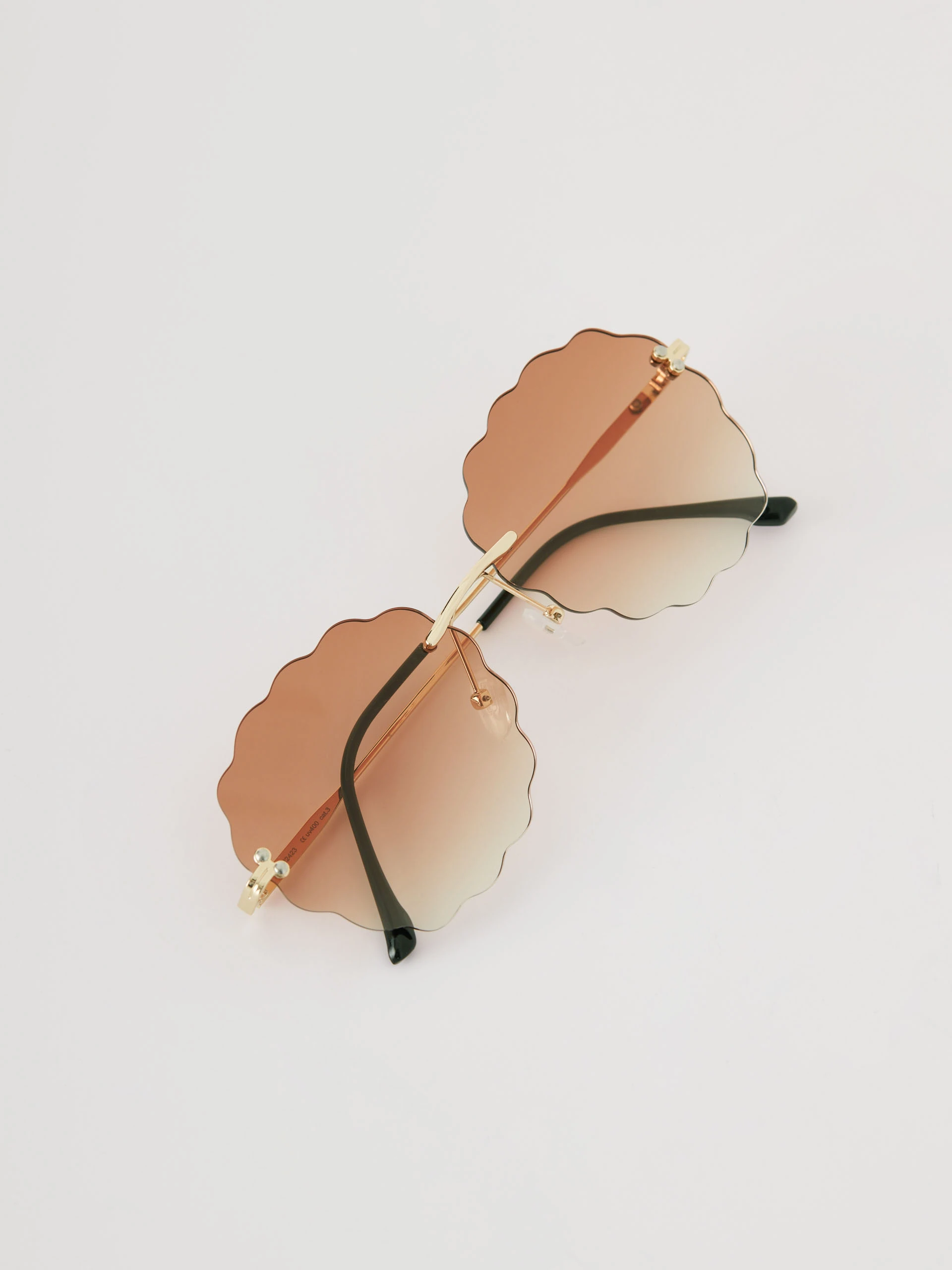 Brown sunglasses with fluted lenses