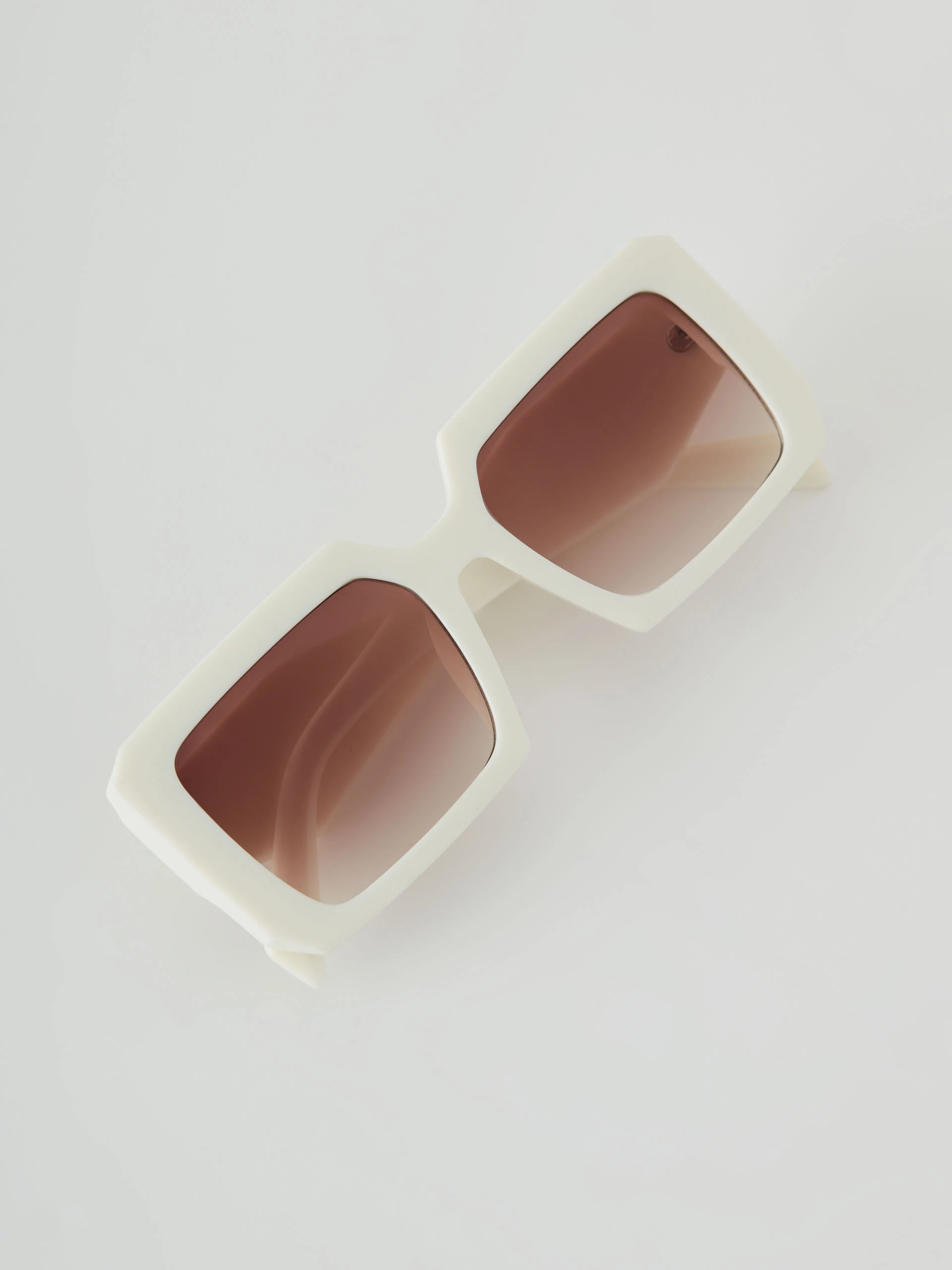 Cream sunglasses with rectangular frames