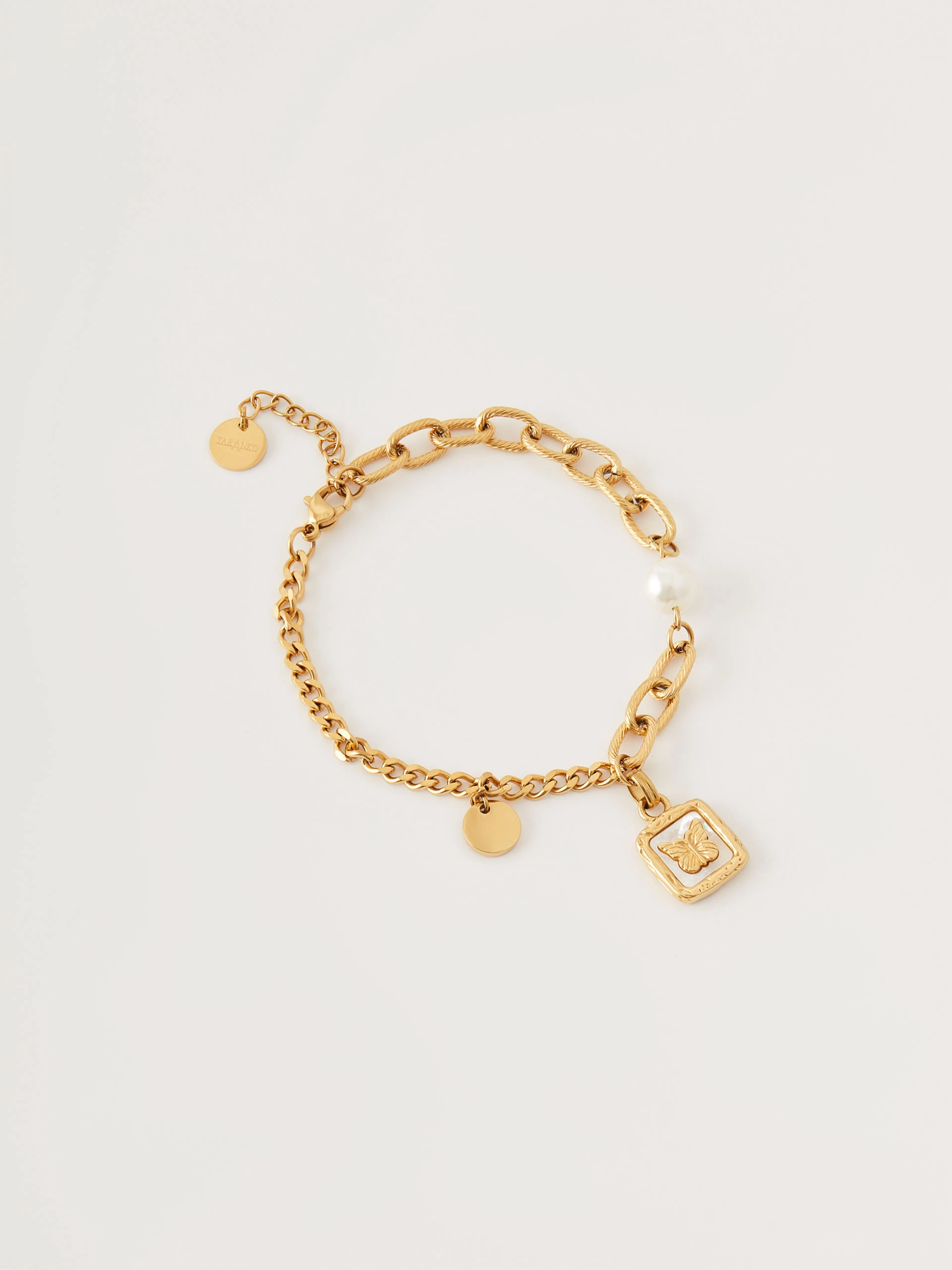 Bracelet with pearl and butterfly pendant