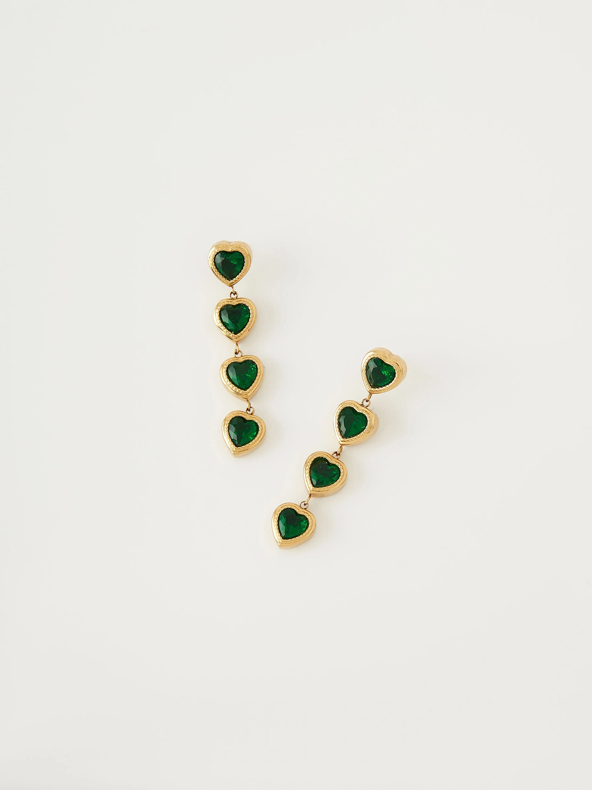 Gold-tone earrings with green hearts