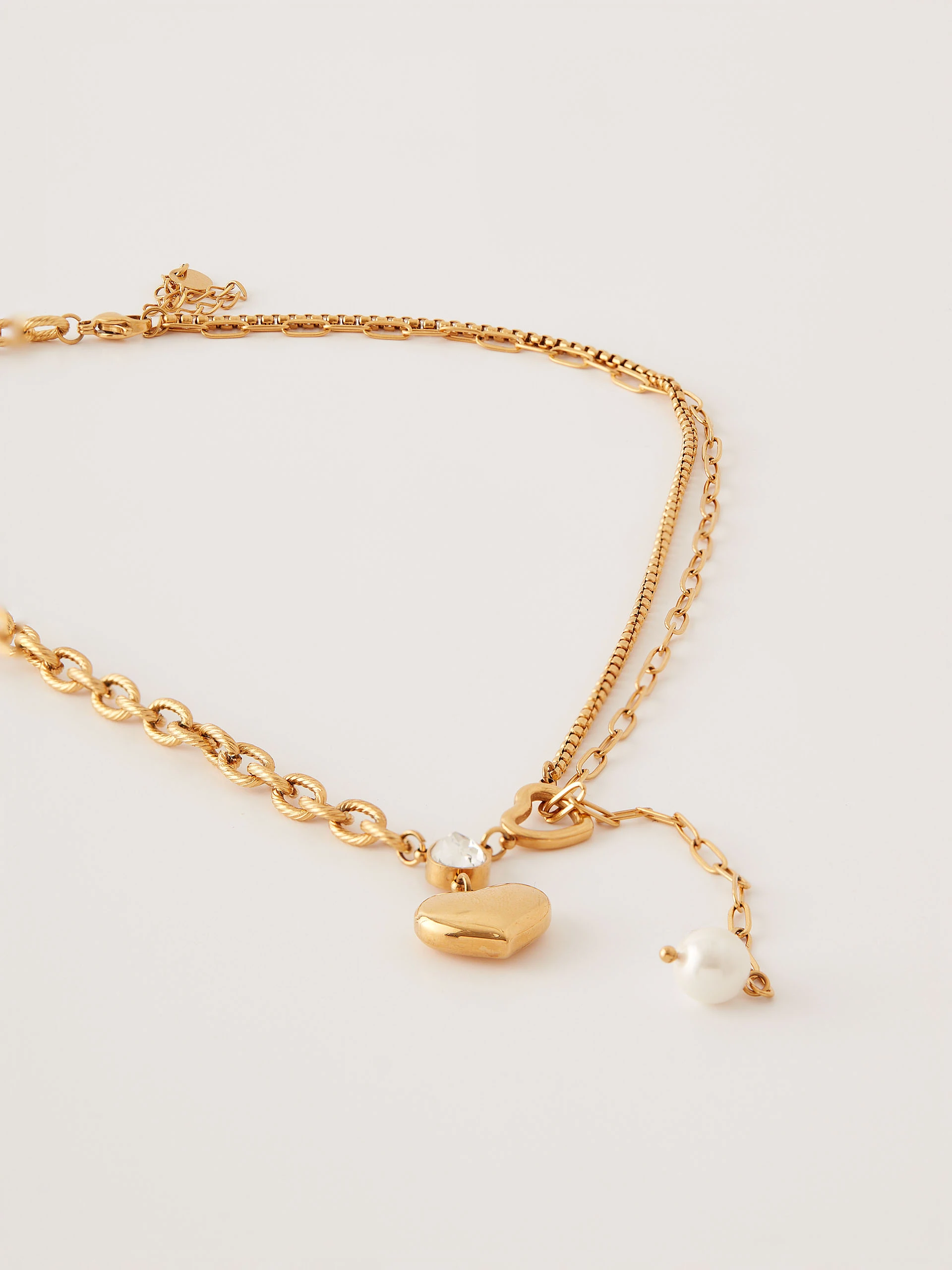 Gold-plated steel necklace with heart-shaped pendant