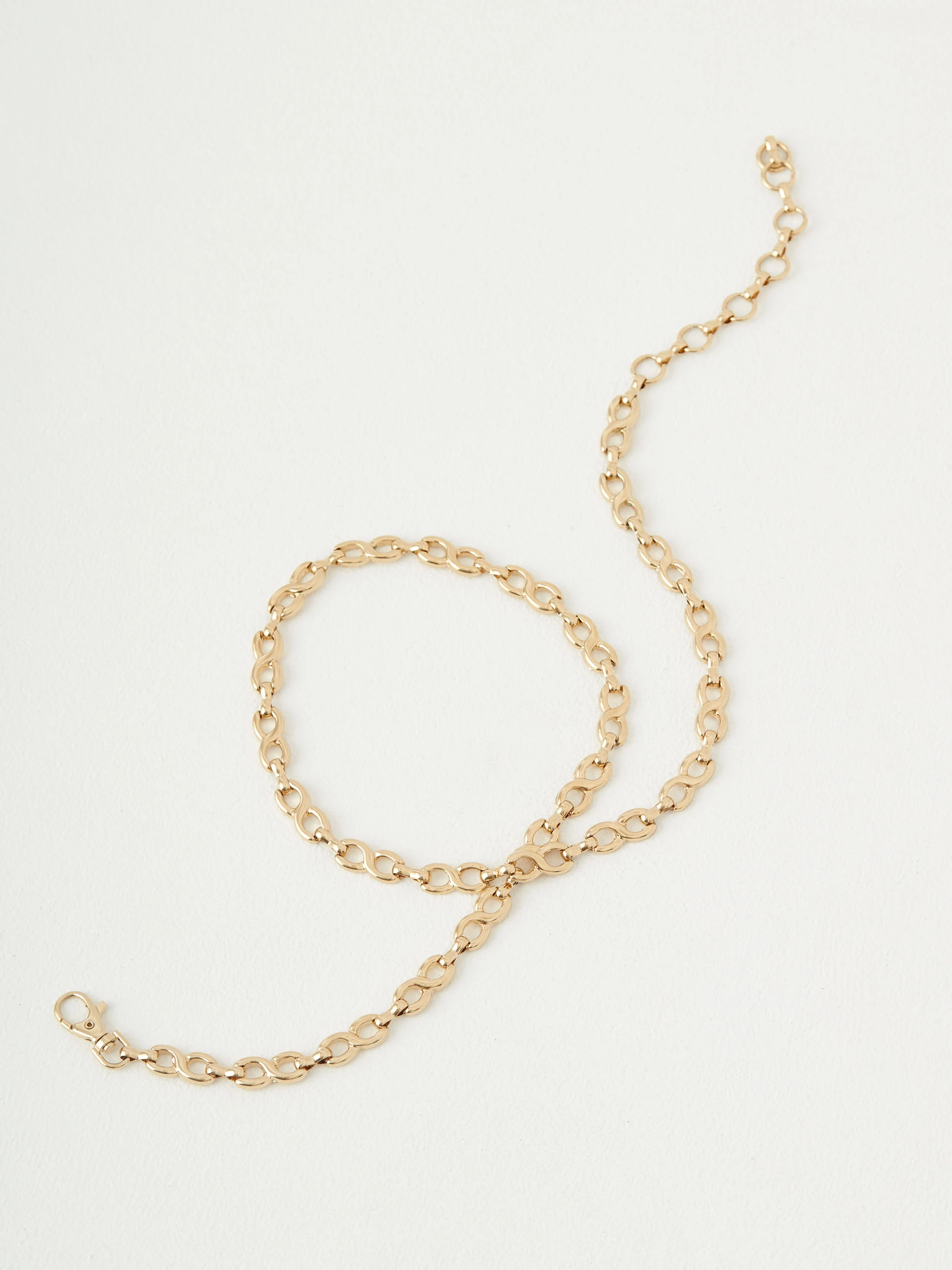 Metal chain strap in gold color