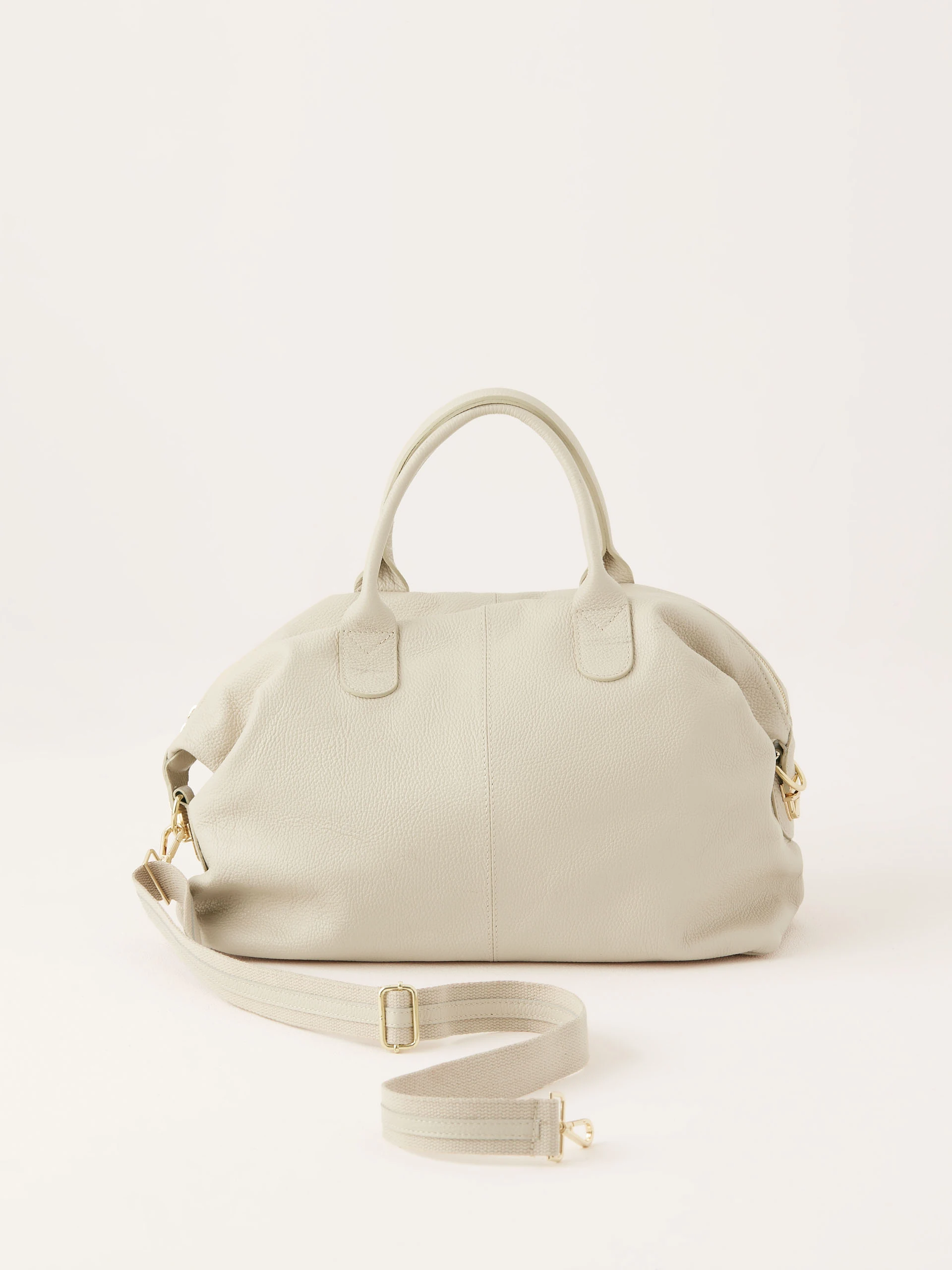 Beige natural leather travel bag