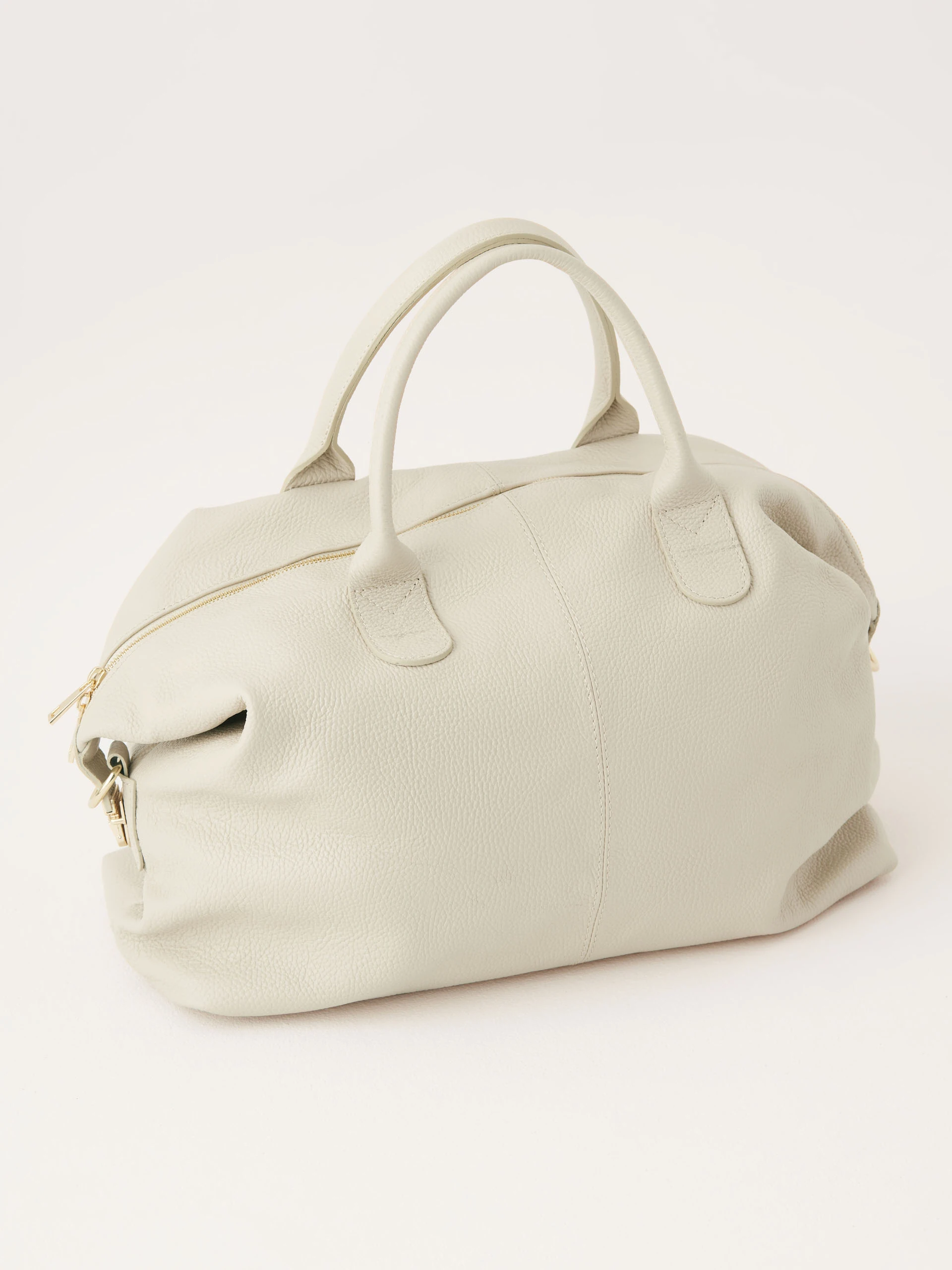 Beige natural leather travel bag