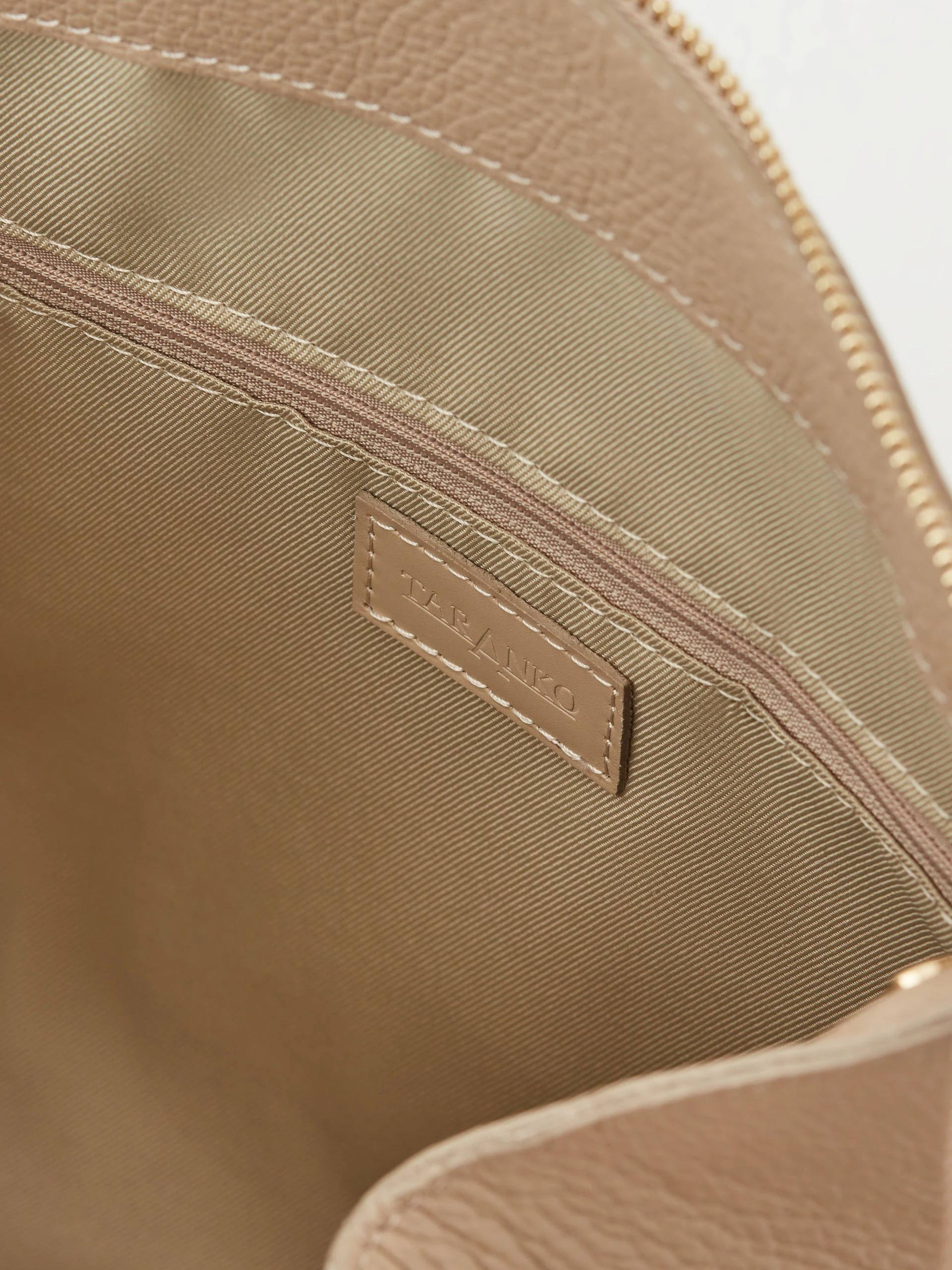 Large handbag in beige color