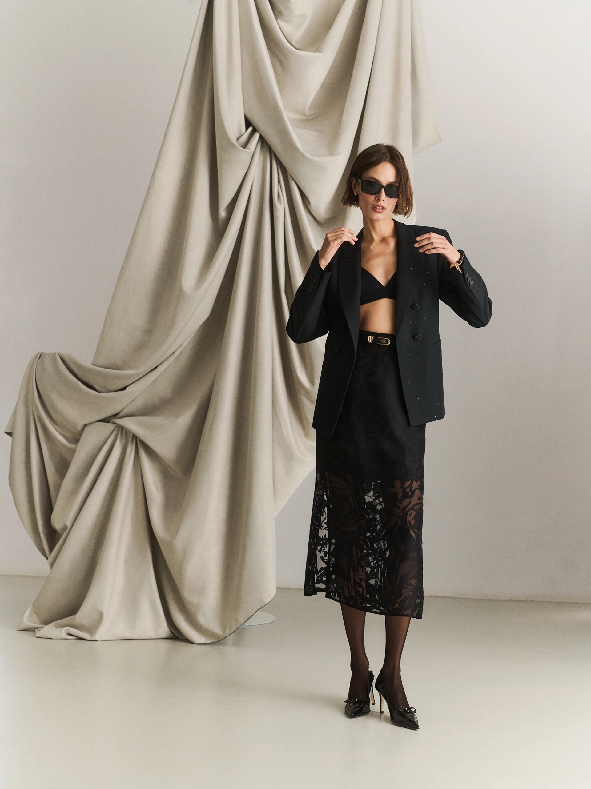 Elegant black jacket with sequin detail