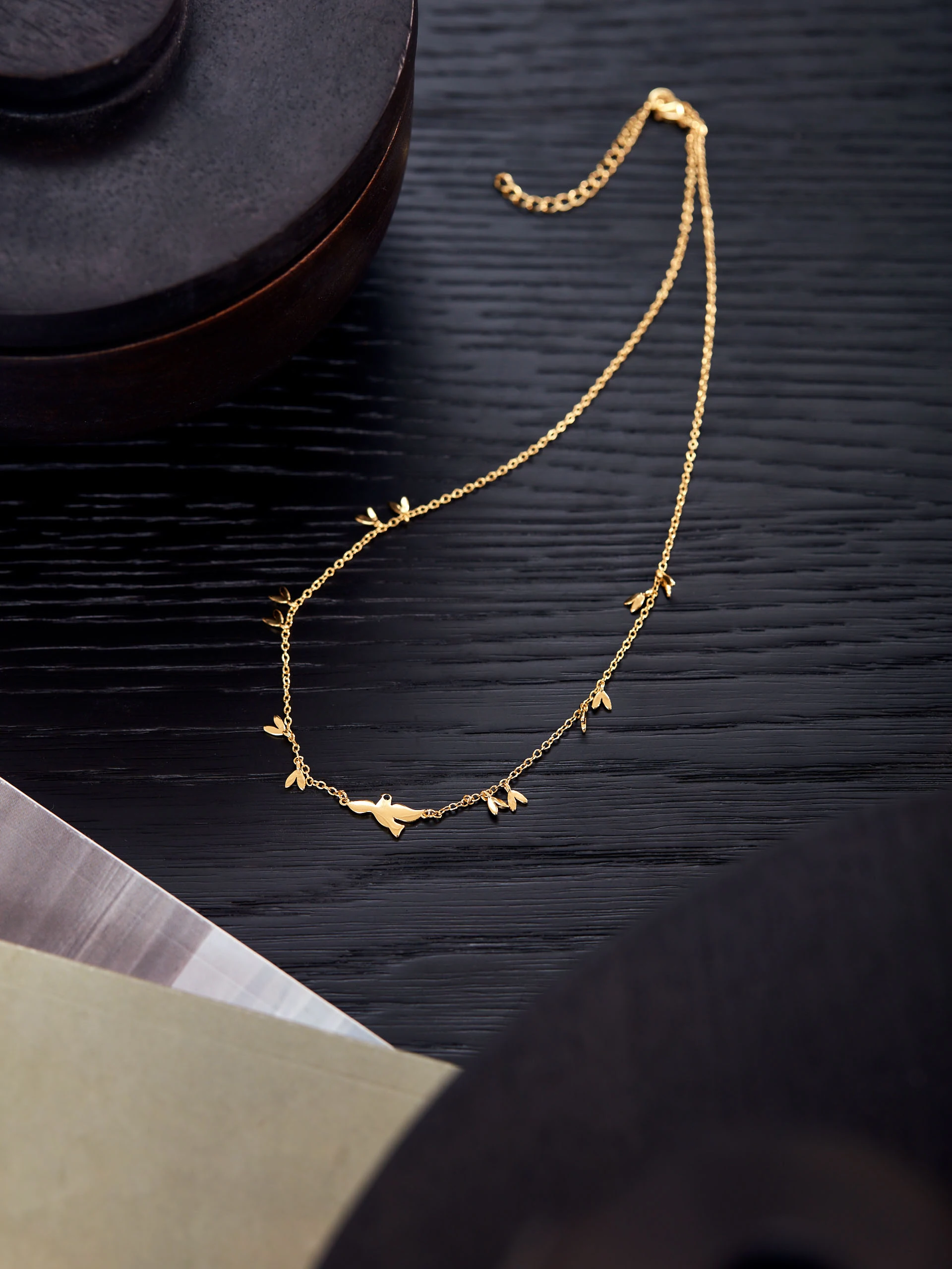 GOLD PLATED NECKLACE WITH PIGEON AND LEAVES