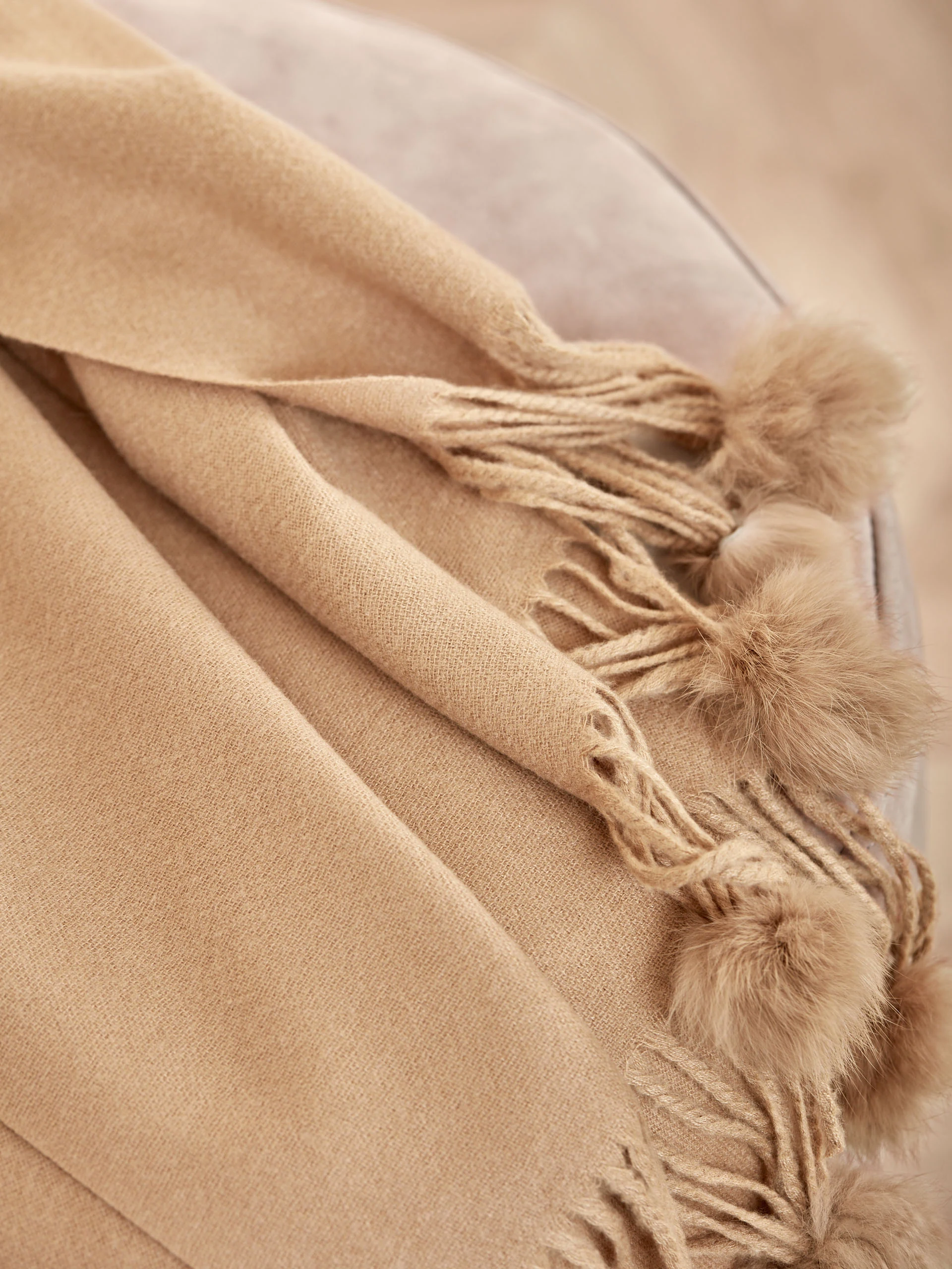 BEIGE SCARF WITH POM-POMS