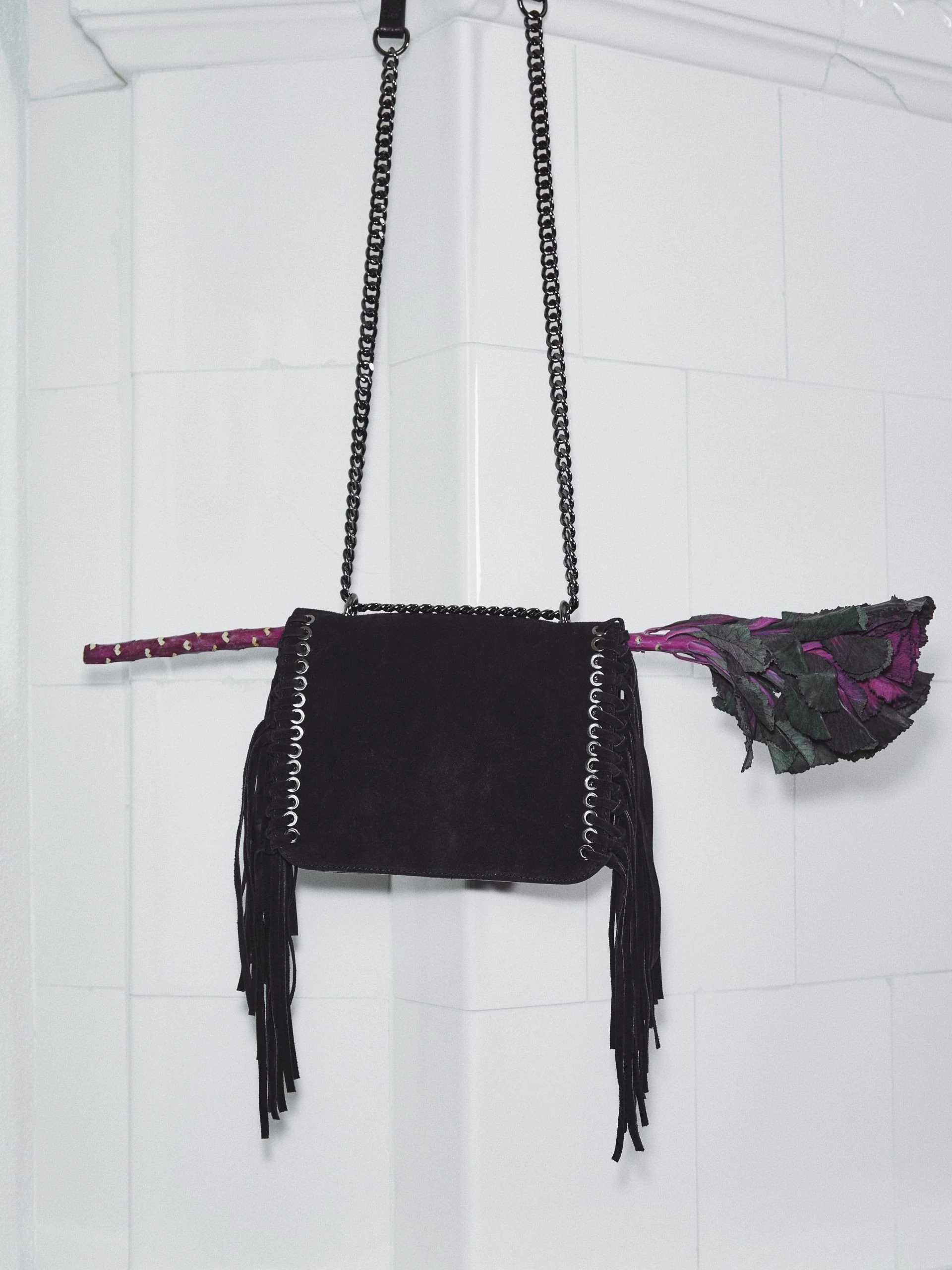 LEATHER HANDBAG WITH TASSELS