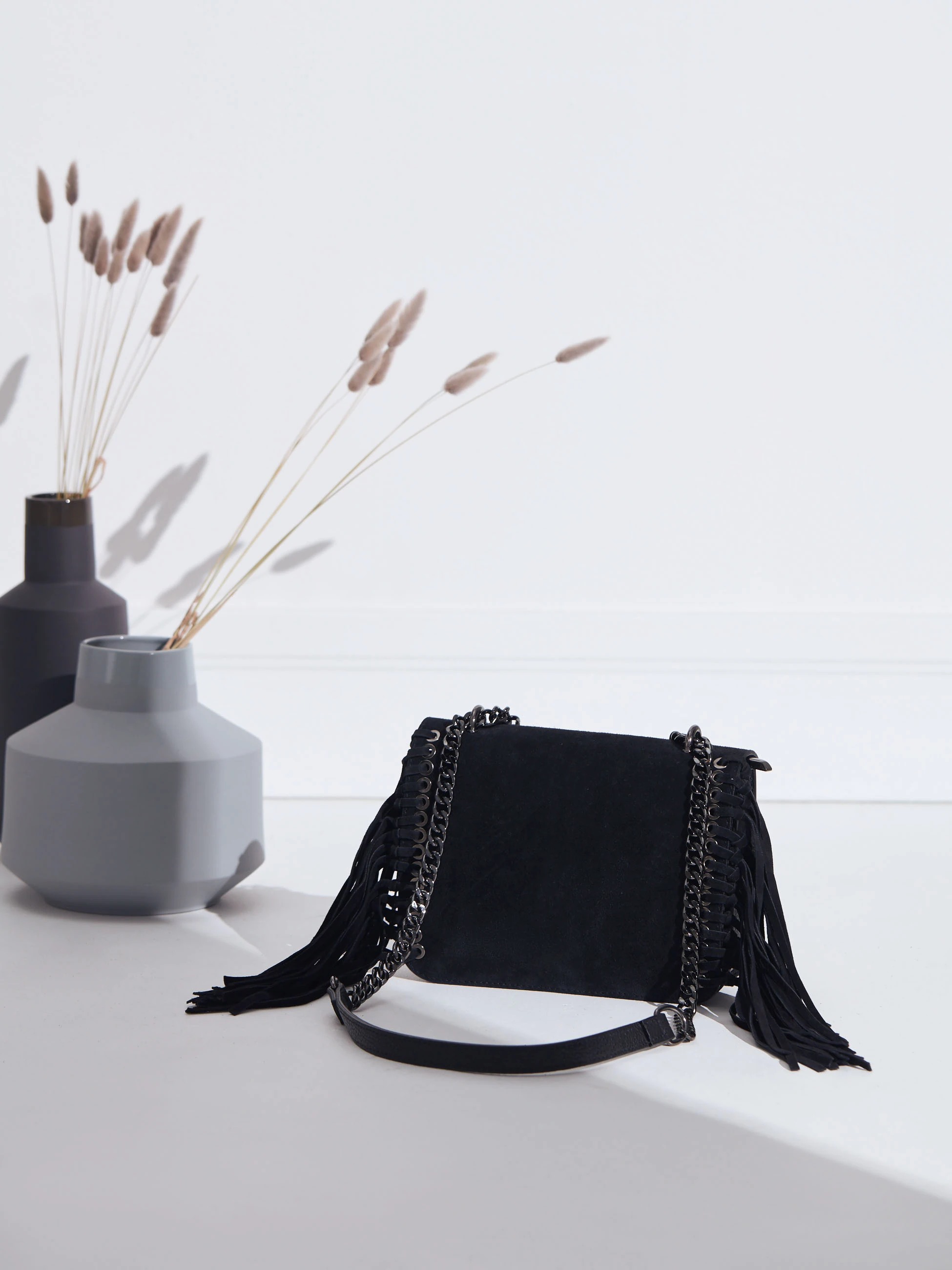 LEATHER HANDBAG WITH TASSELS