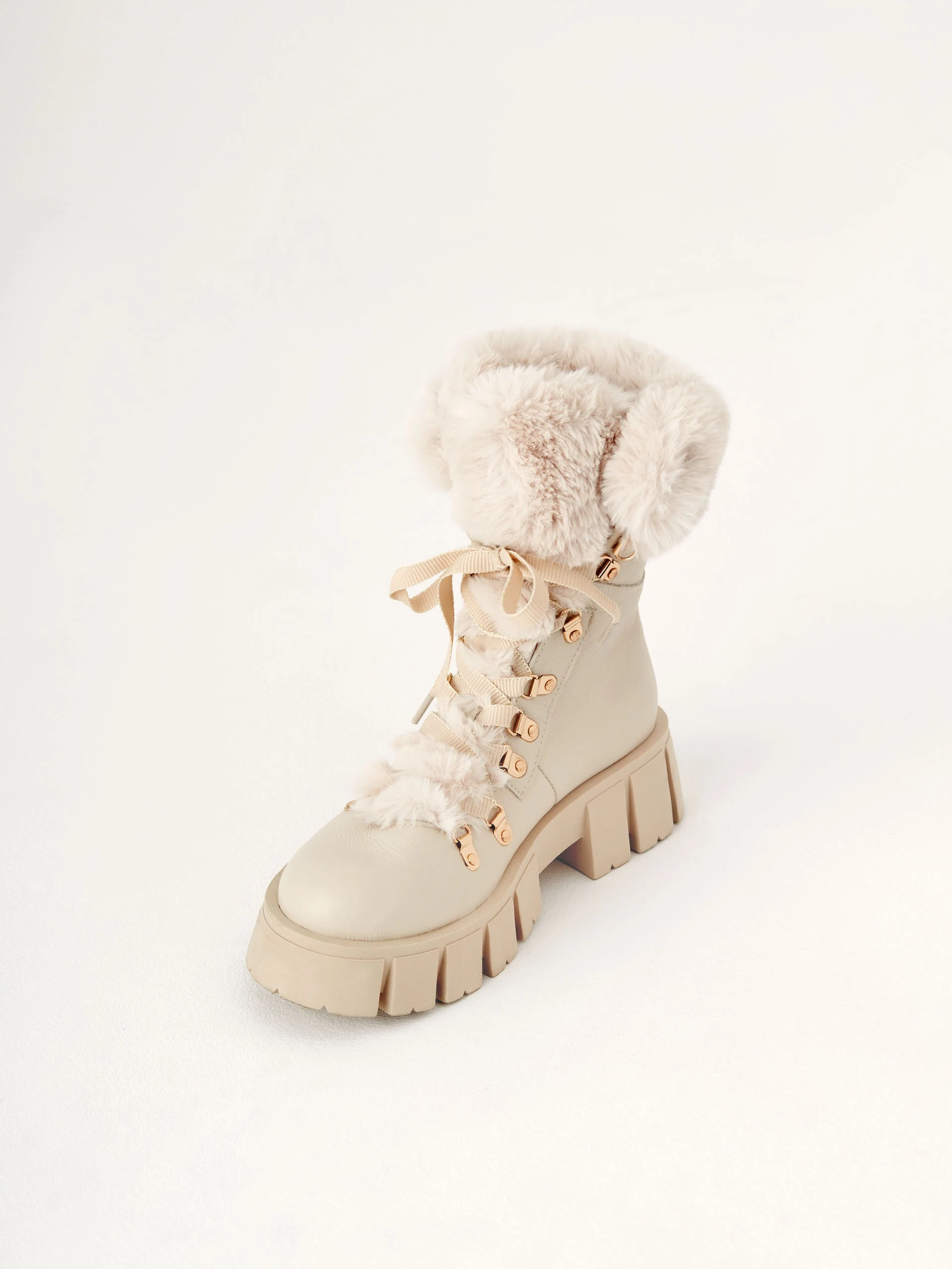 Lace-up boots in beige color