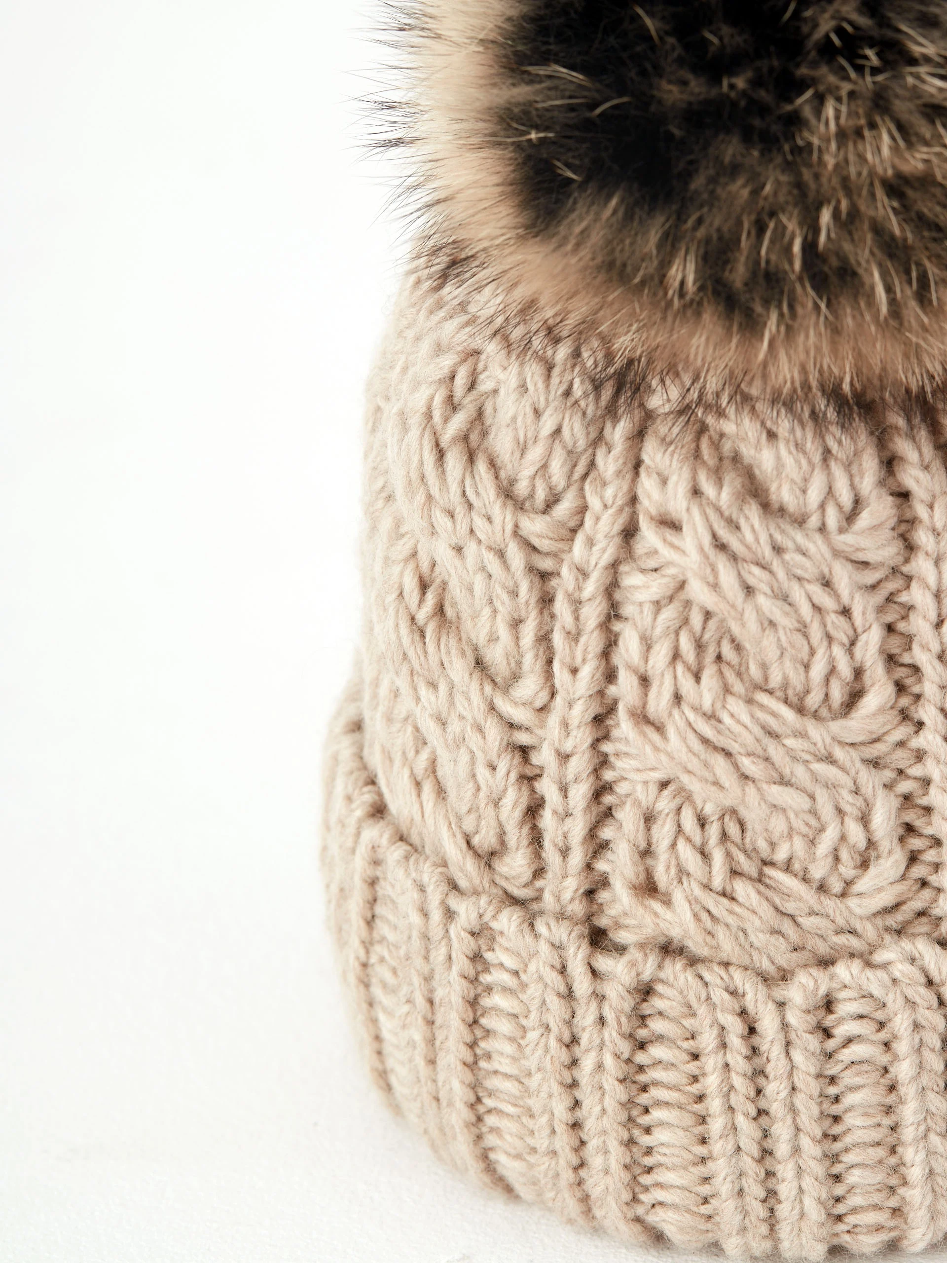 Wool cap with pompom
