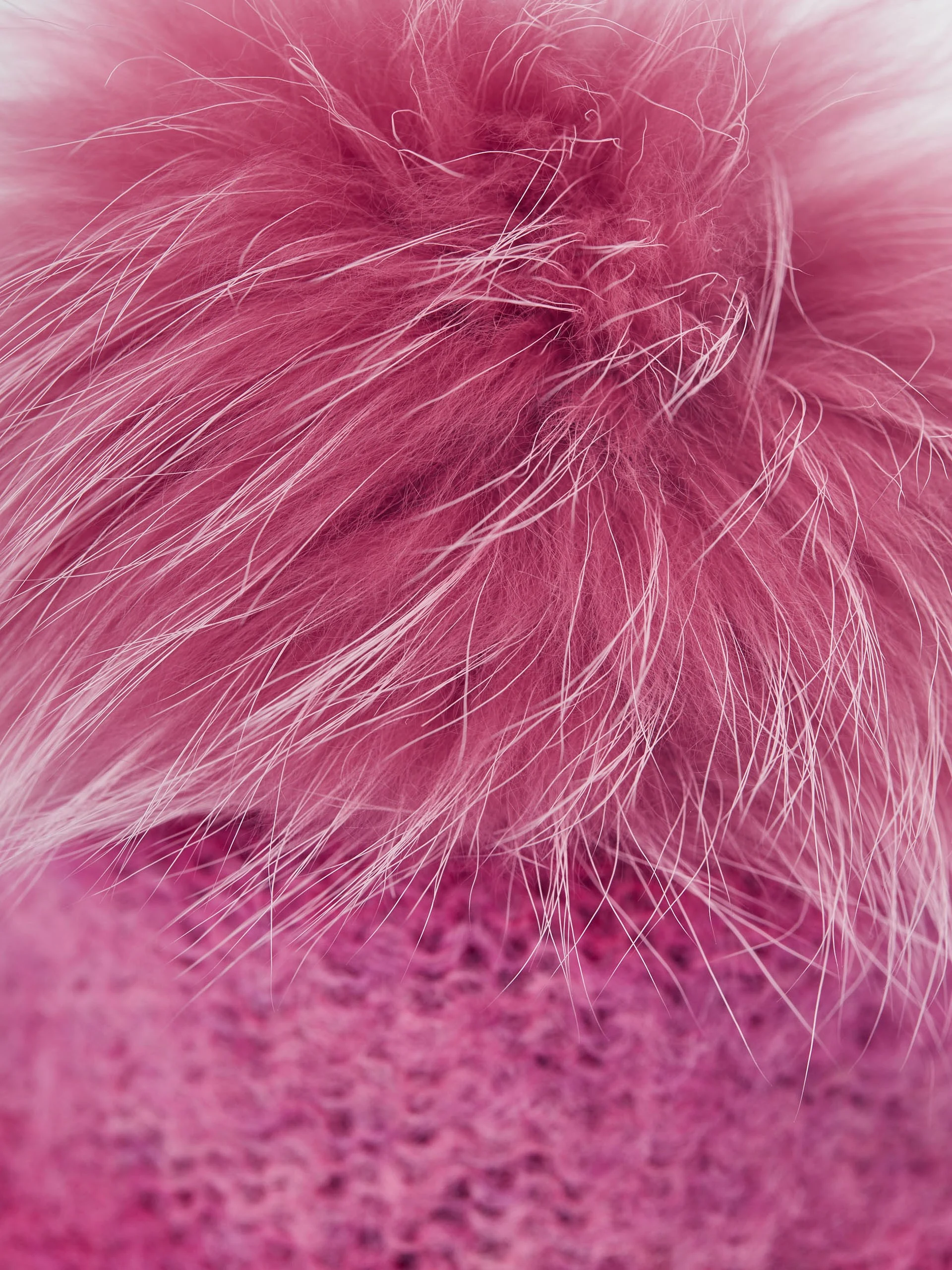 Pink beanie with pom-pom