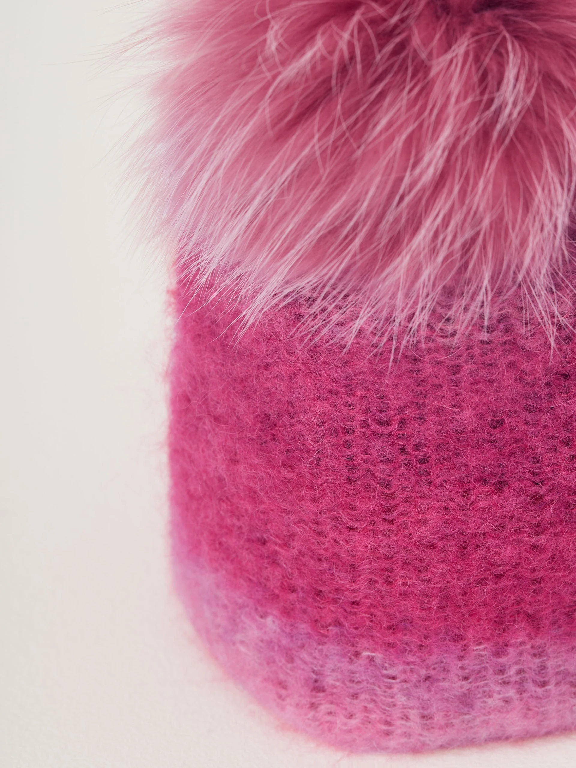 Pink beanie with pom-pom