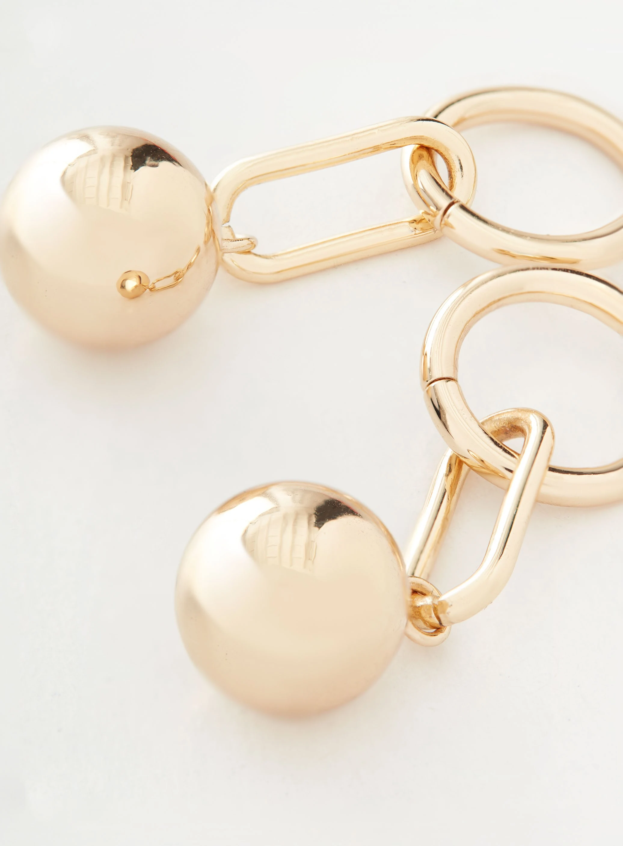 Earrings finished with a gold bead