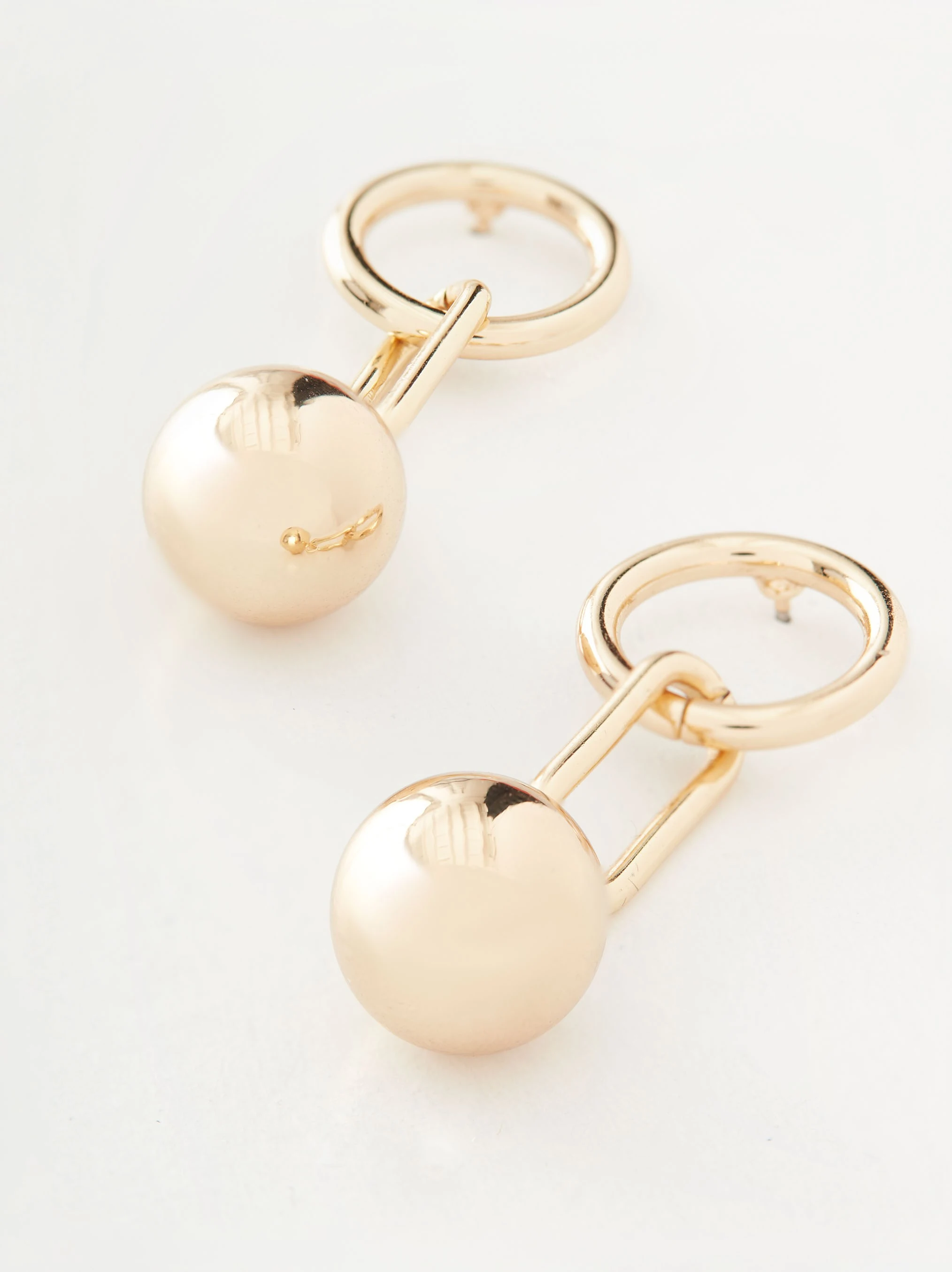 Earrings finished with a gold bead