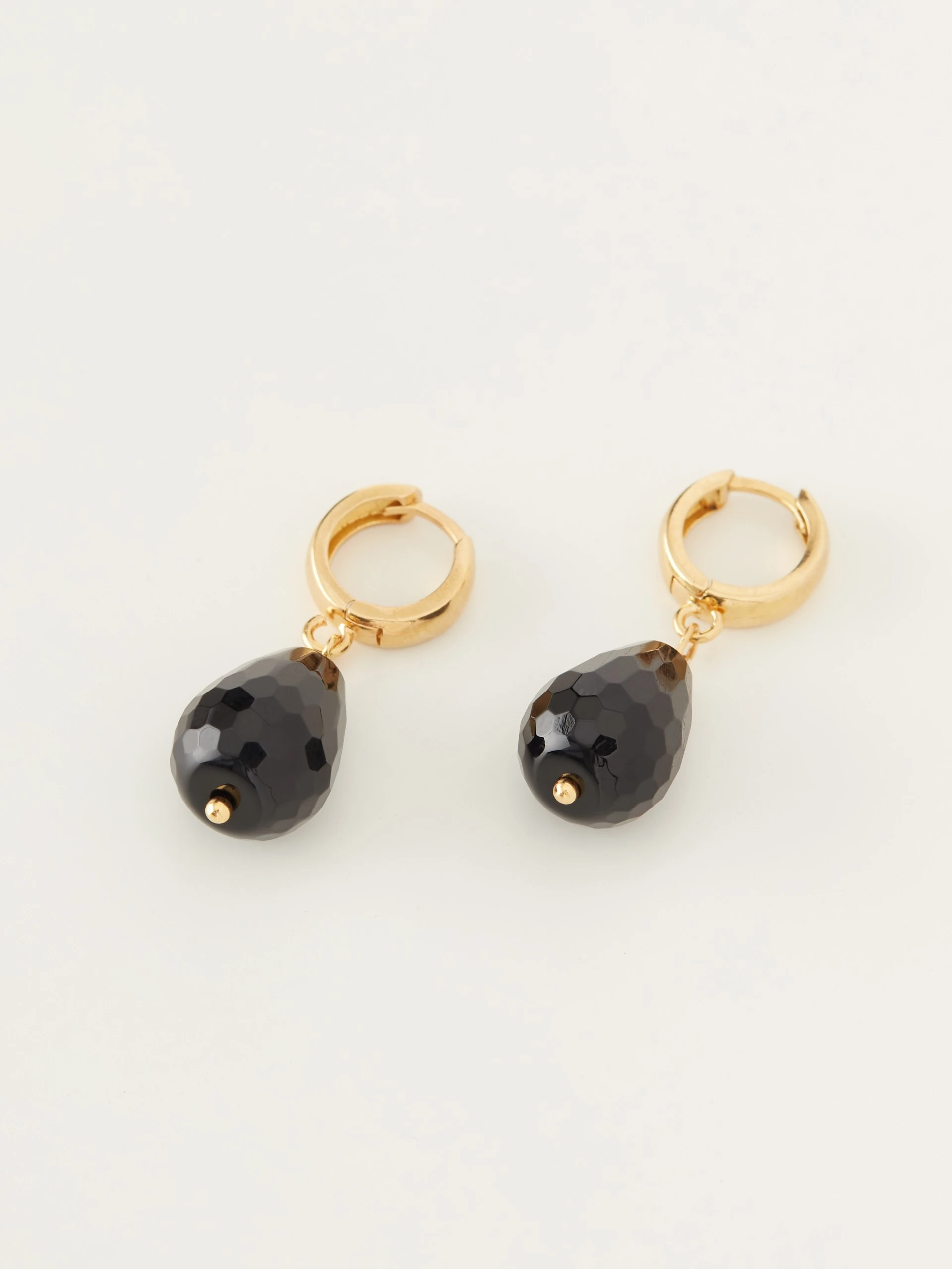 Classic earrings with decorative onyx