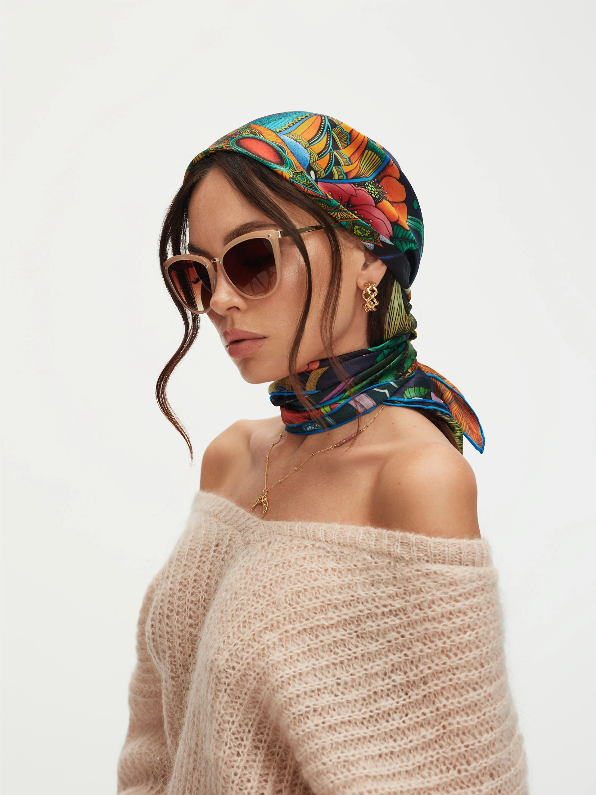 Beige sunglasses in cat-eye shape