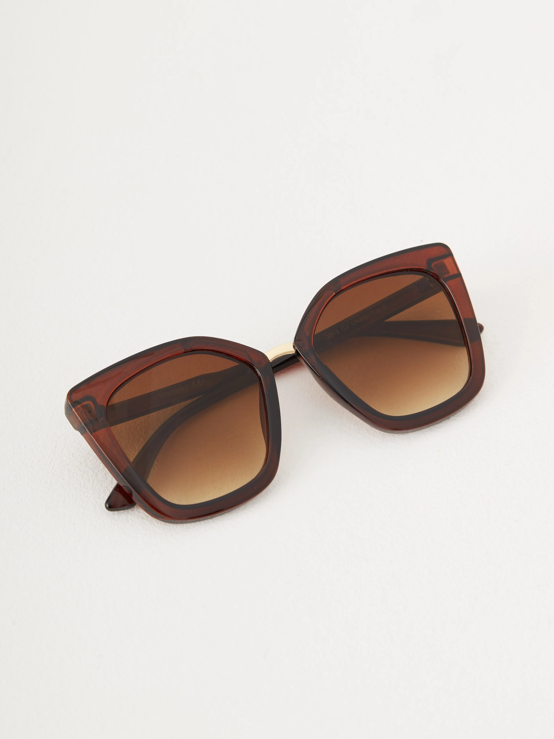 Brown sunglasses in cat-eye shape