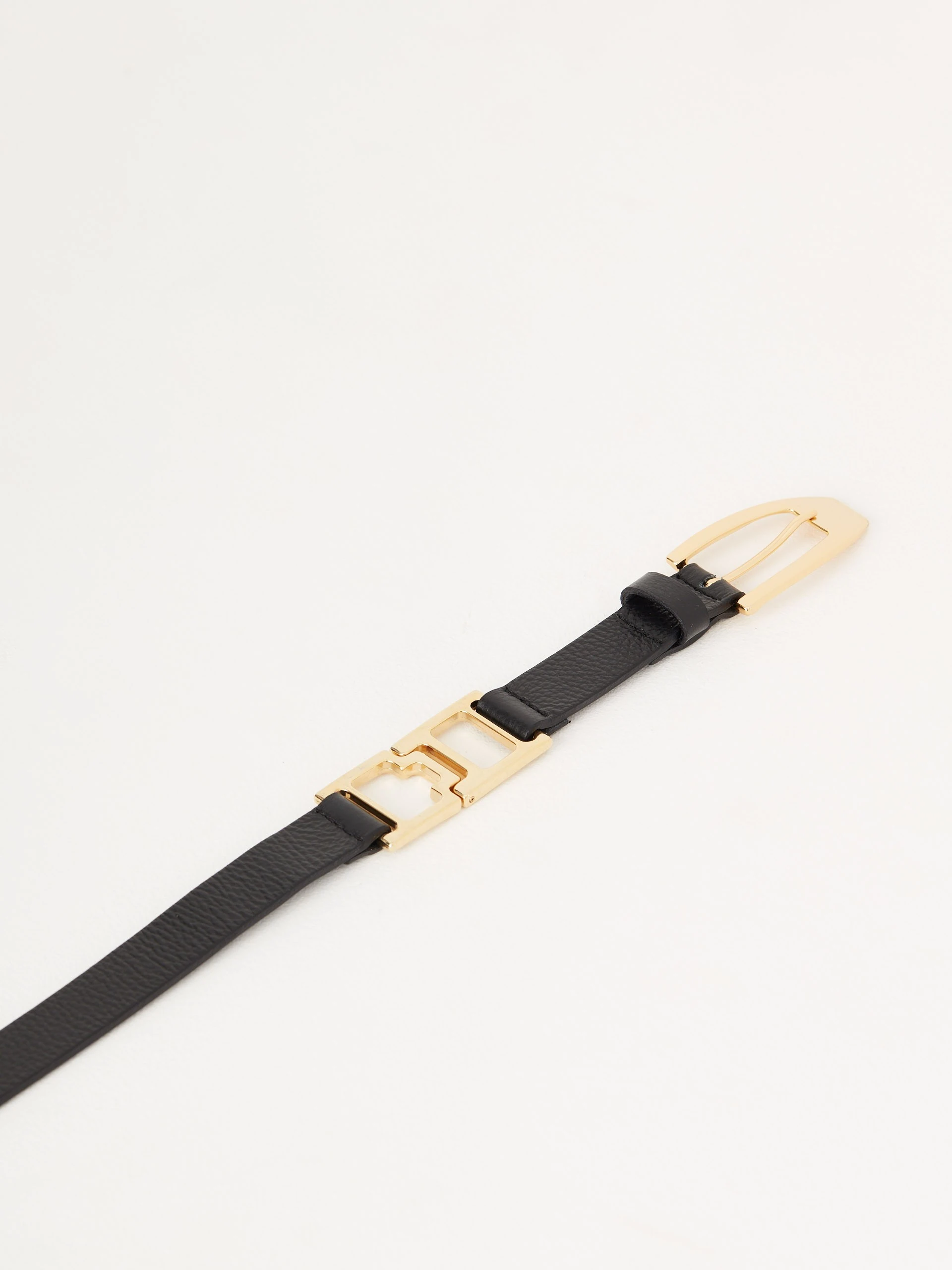 Black belt with gold buckle