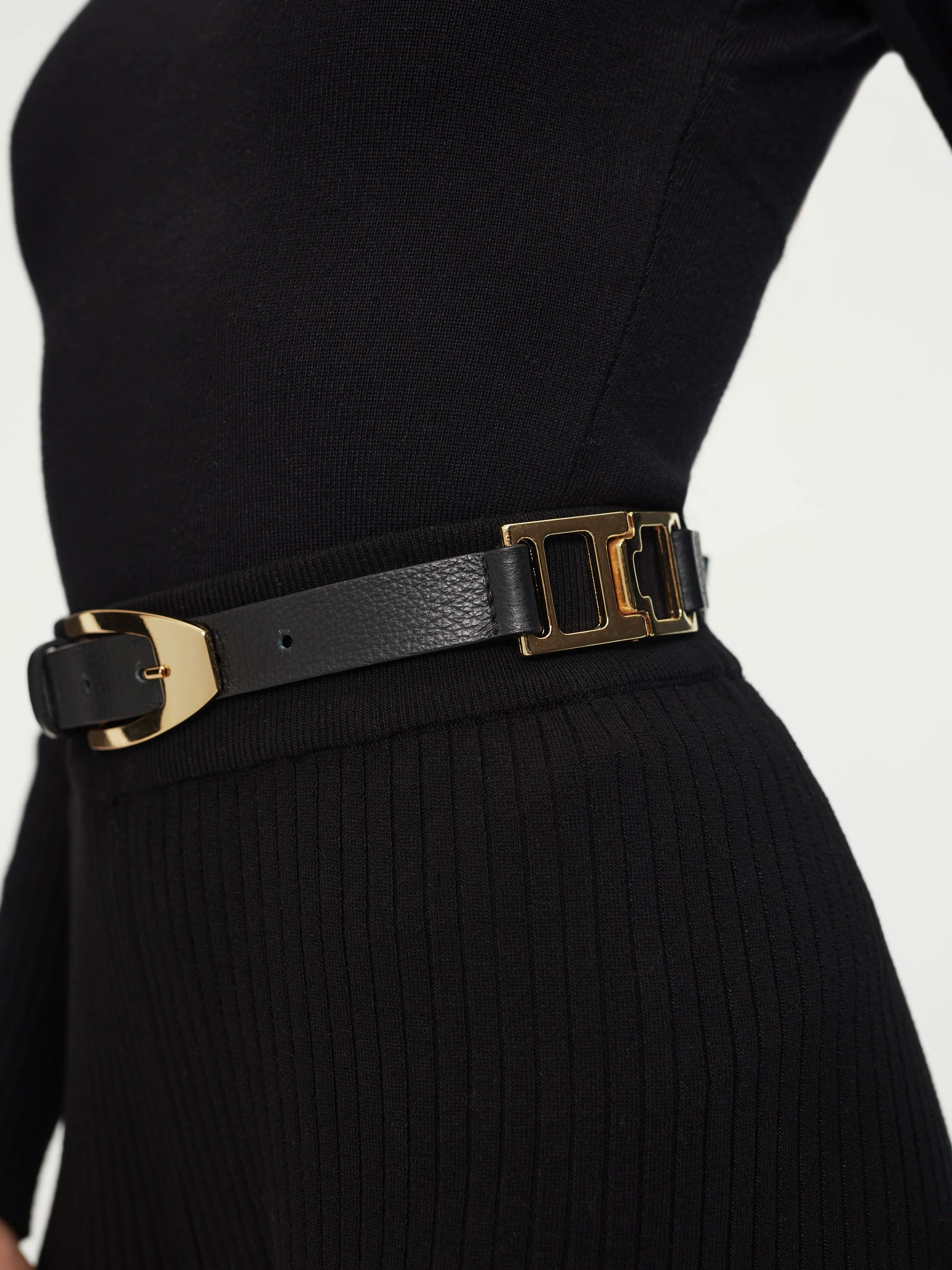 Black belt with gold buckle