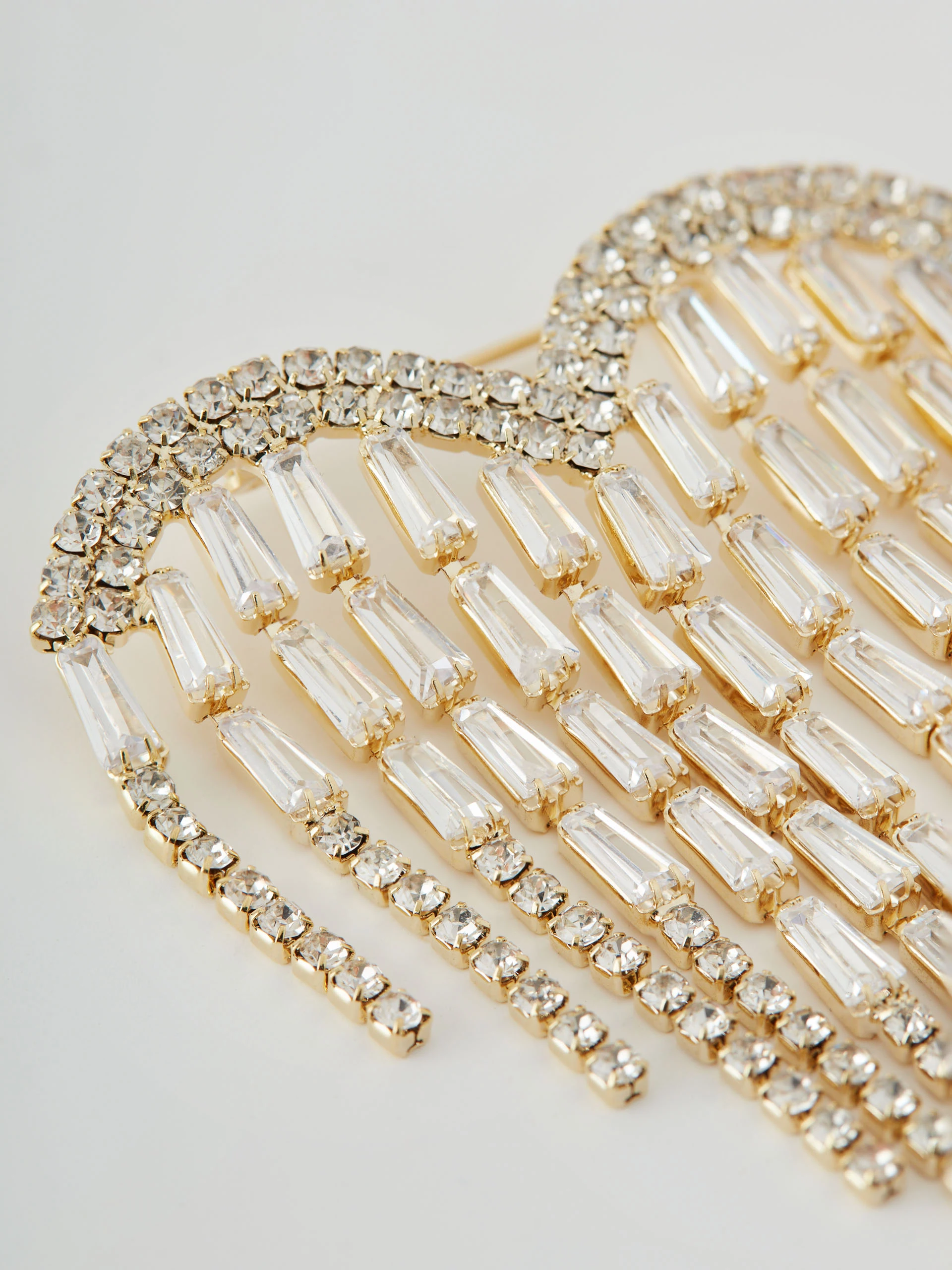 Brooch with cascading ornaments