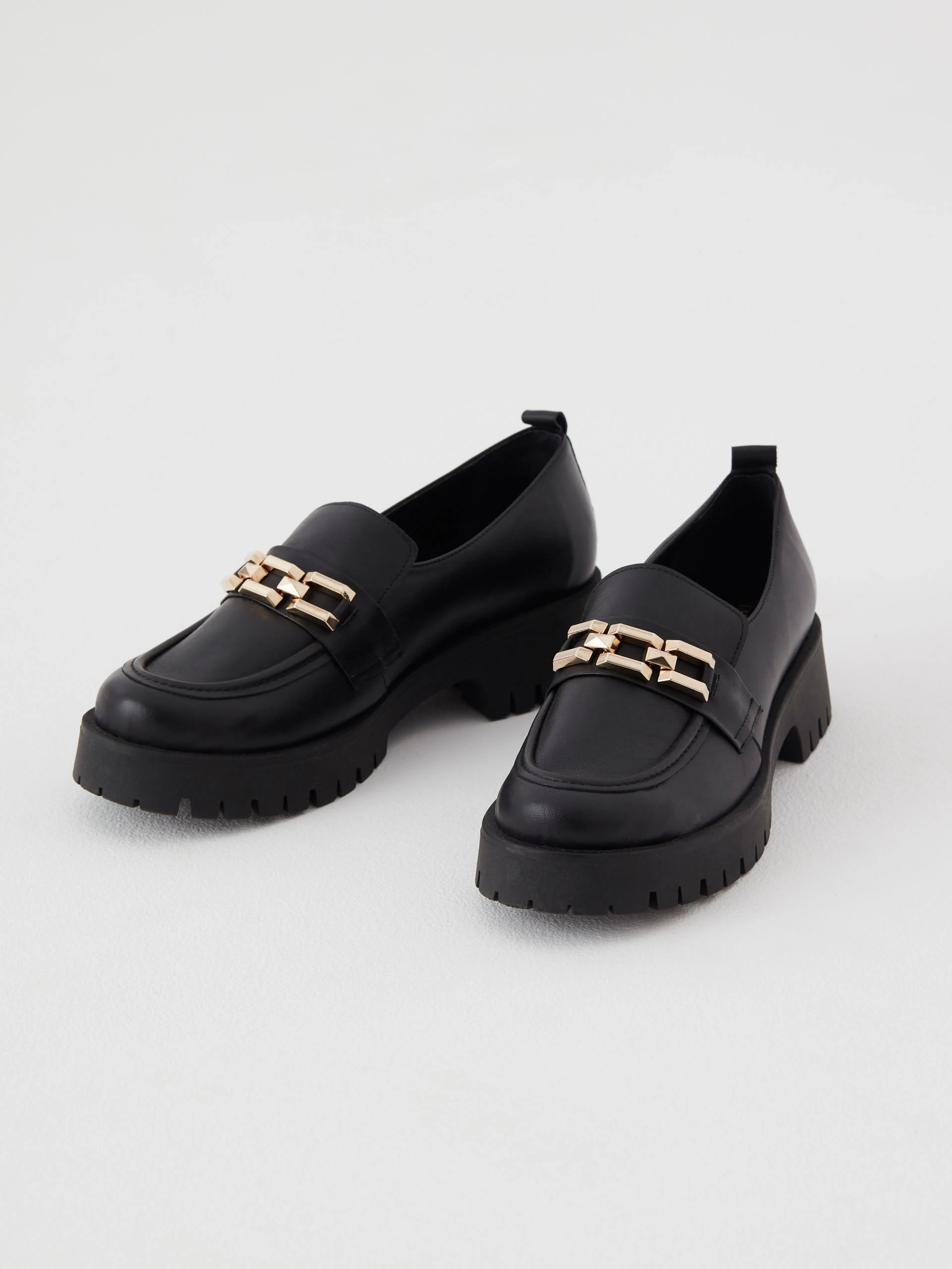 Moccasins made of natural grain leather in color black