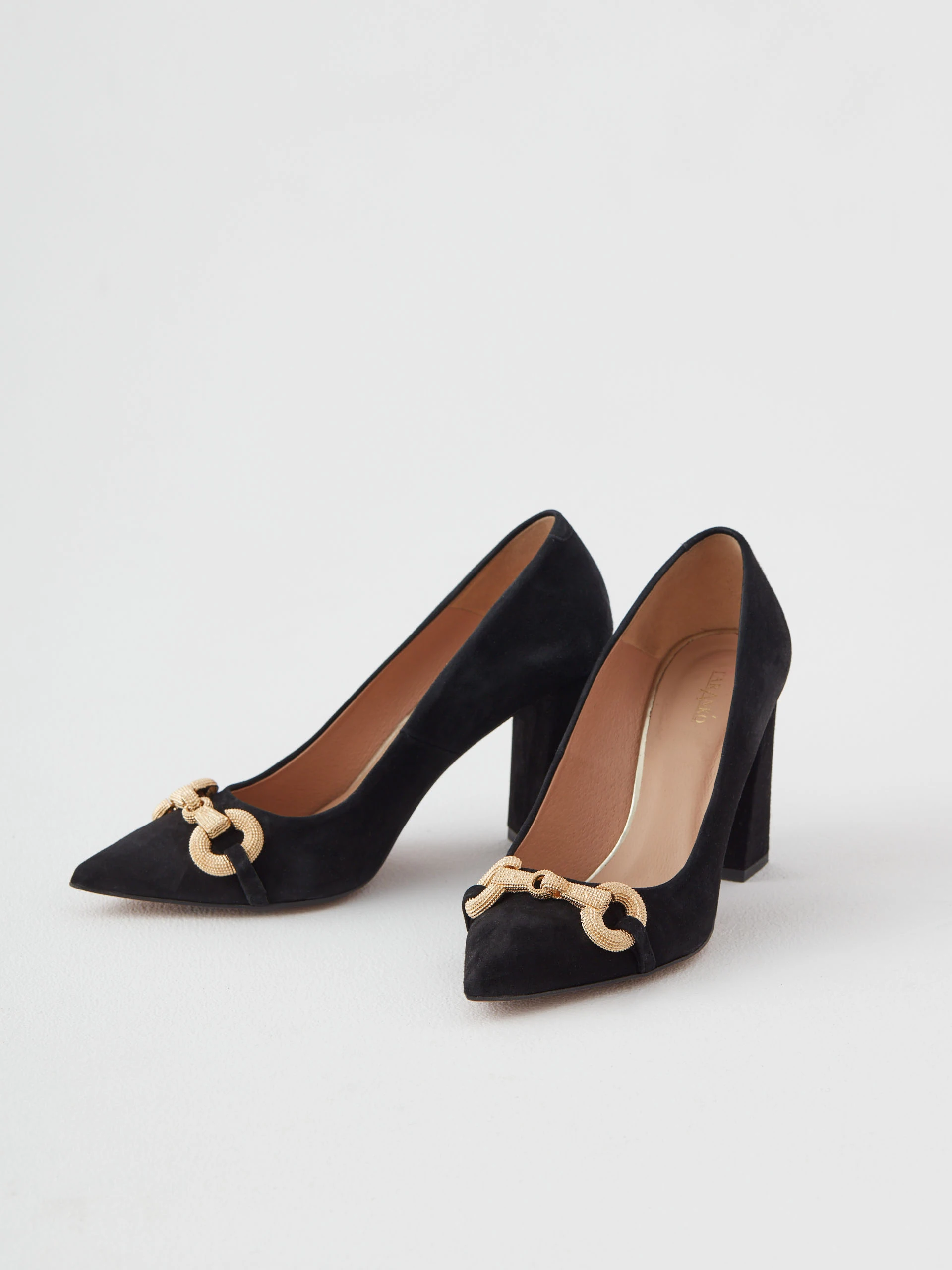 Black suede pumps with buckle