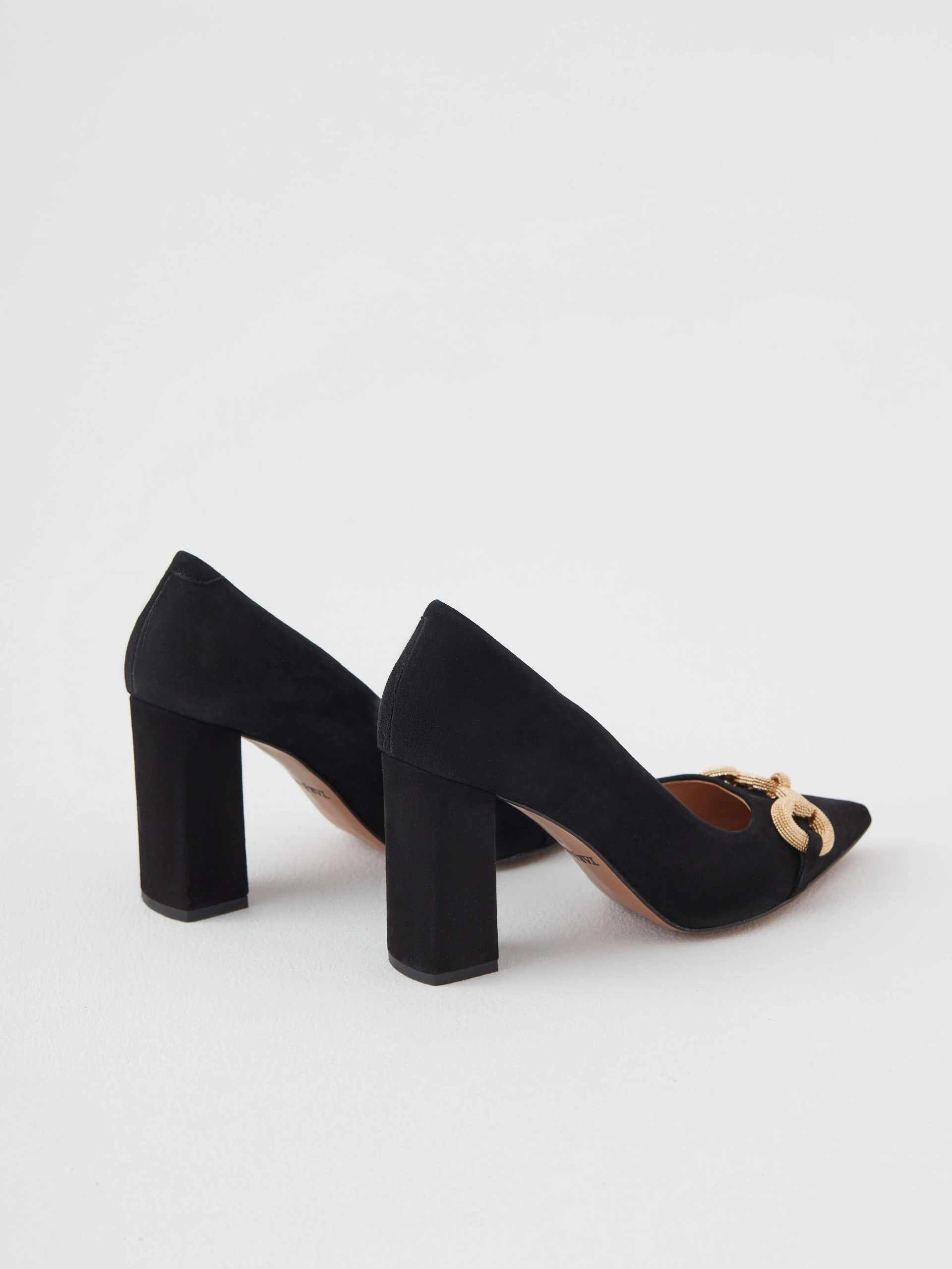 Black suede pumps with buckle