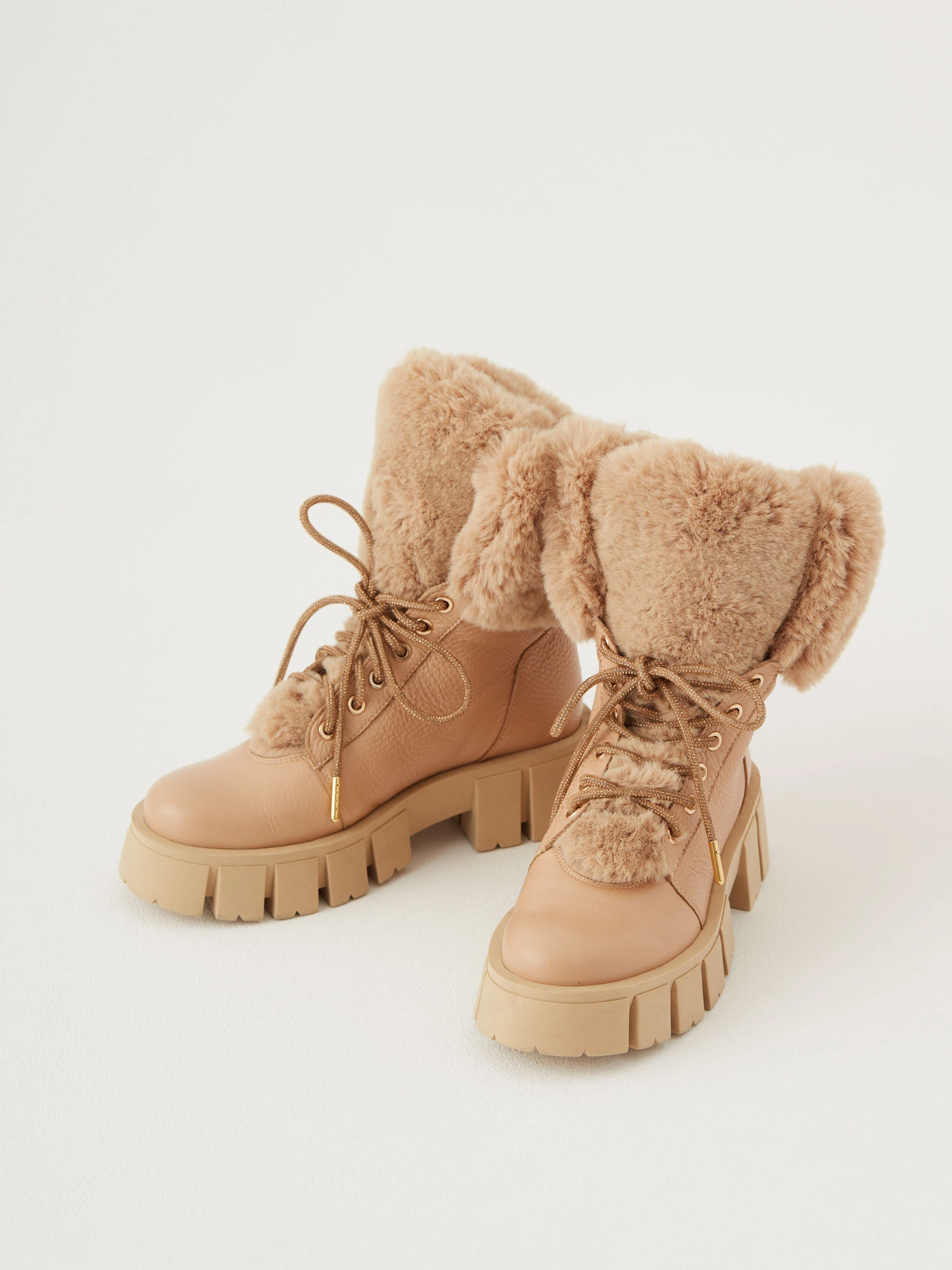 Warmed leather boots