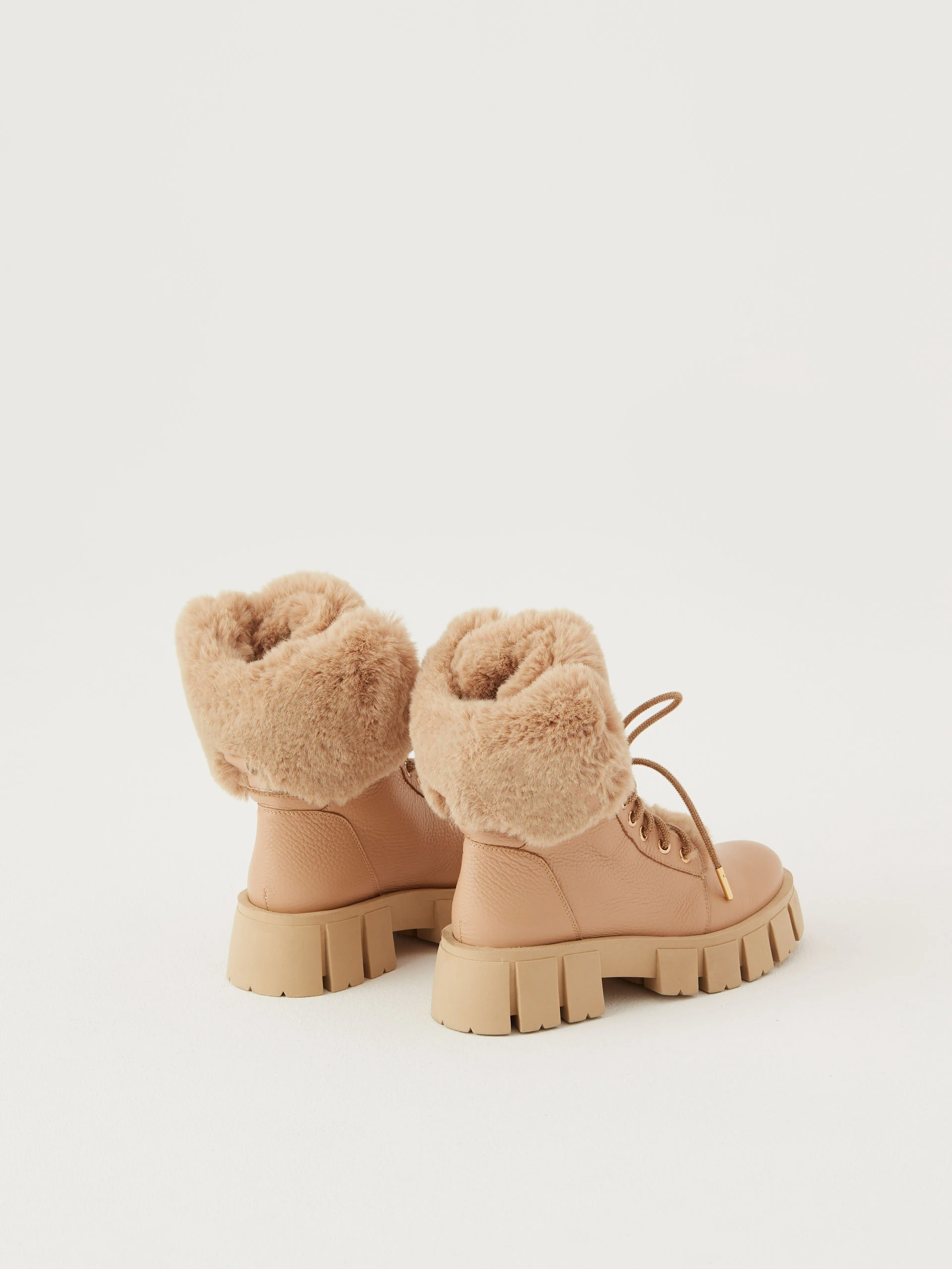 Warmed leather boots