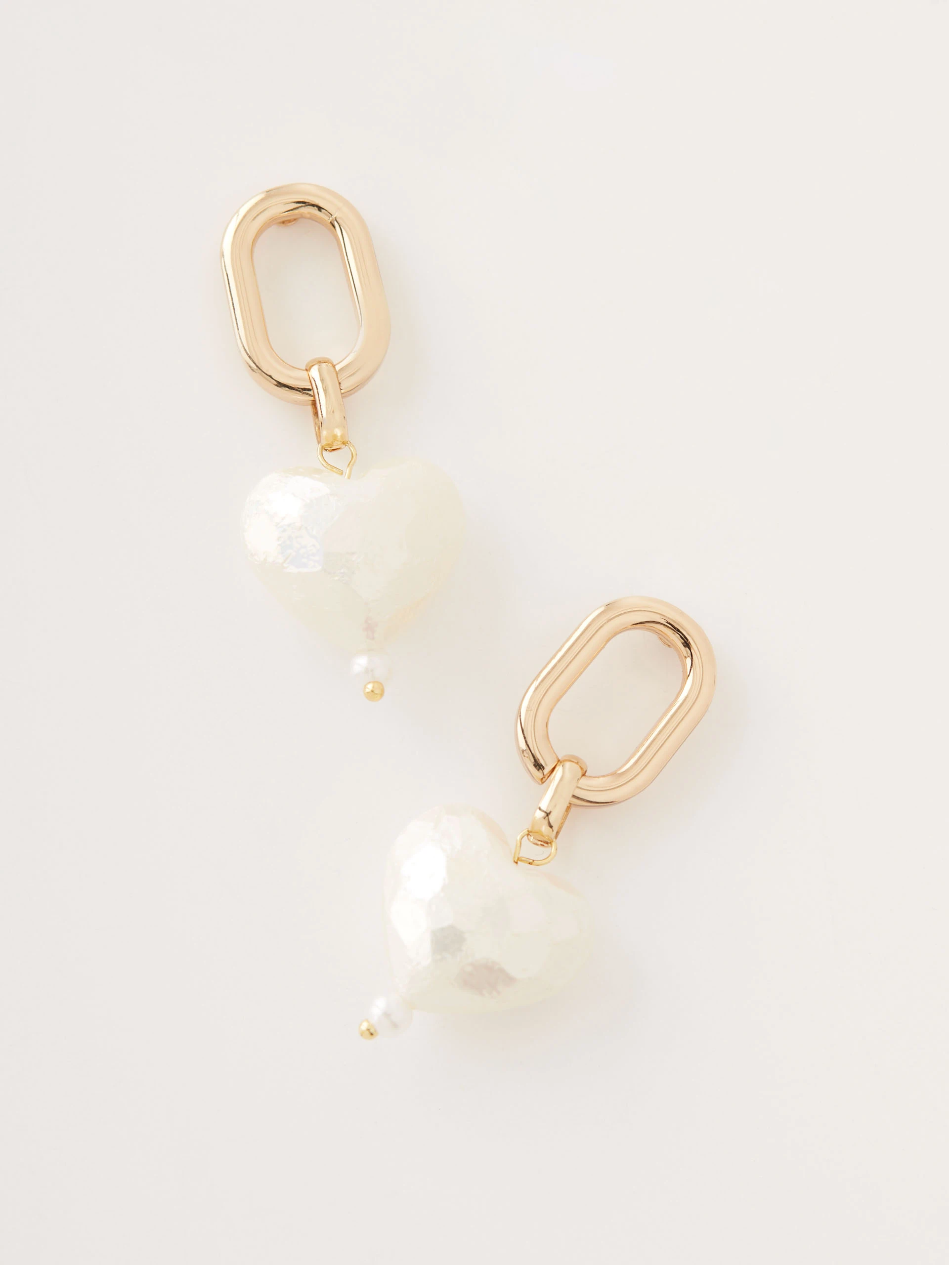 Earrings with heart-shaped pendants