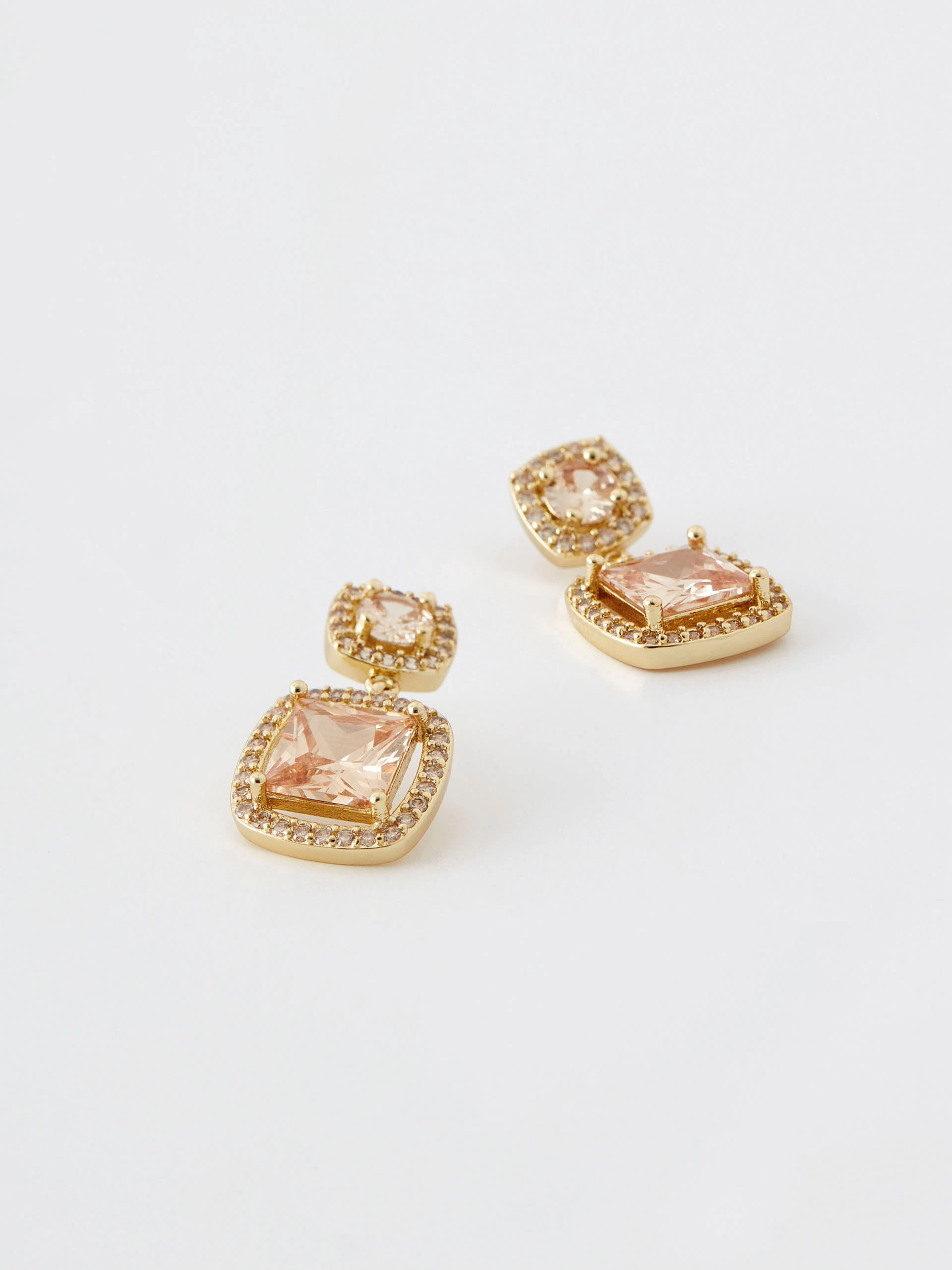 Champagne colored earrings with ornaments