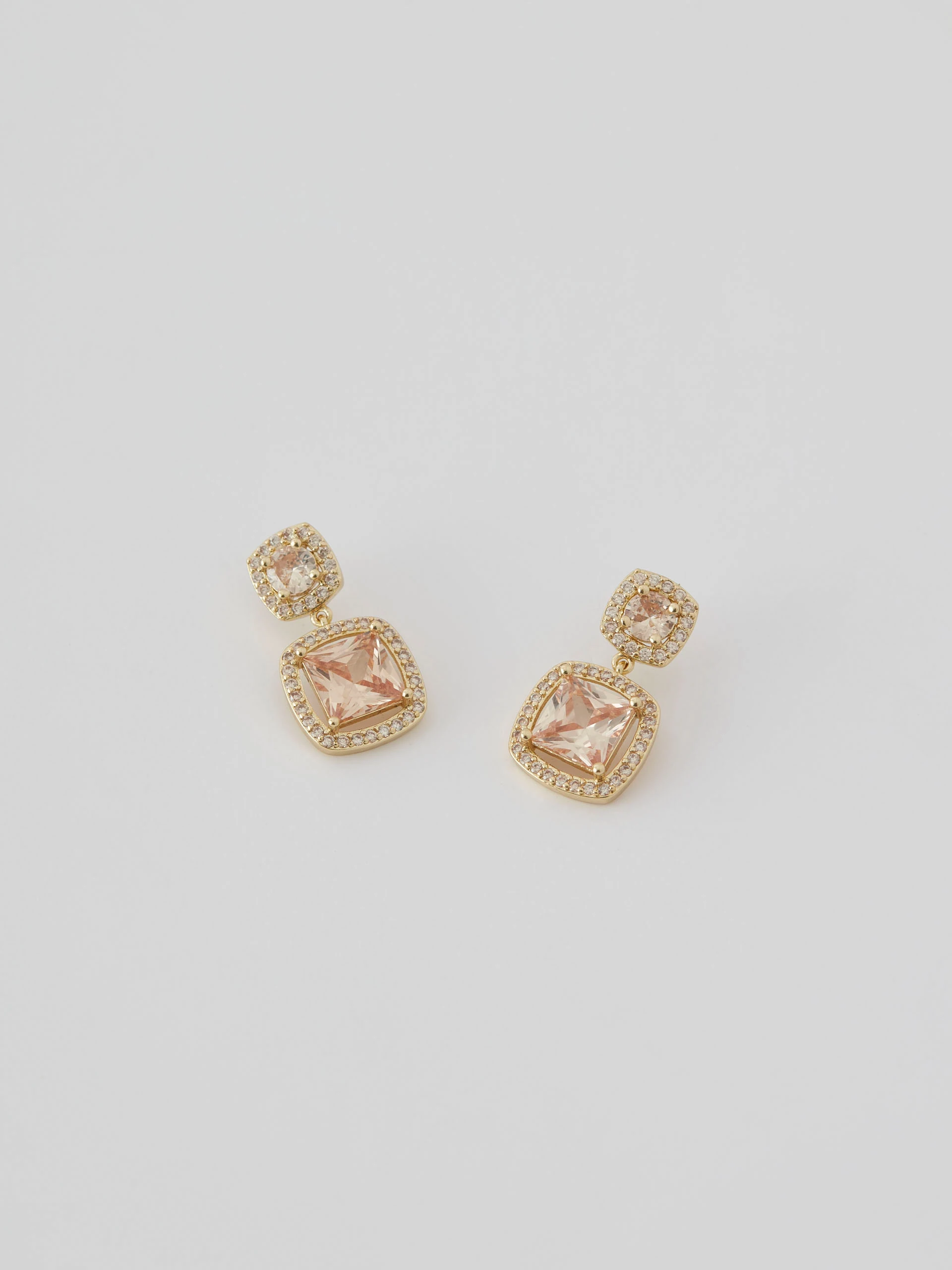 Champagne colored earrings with ornaments