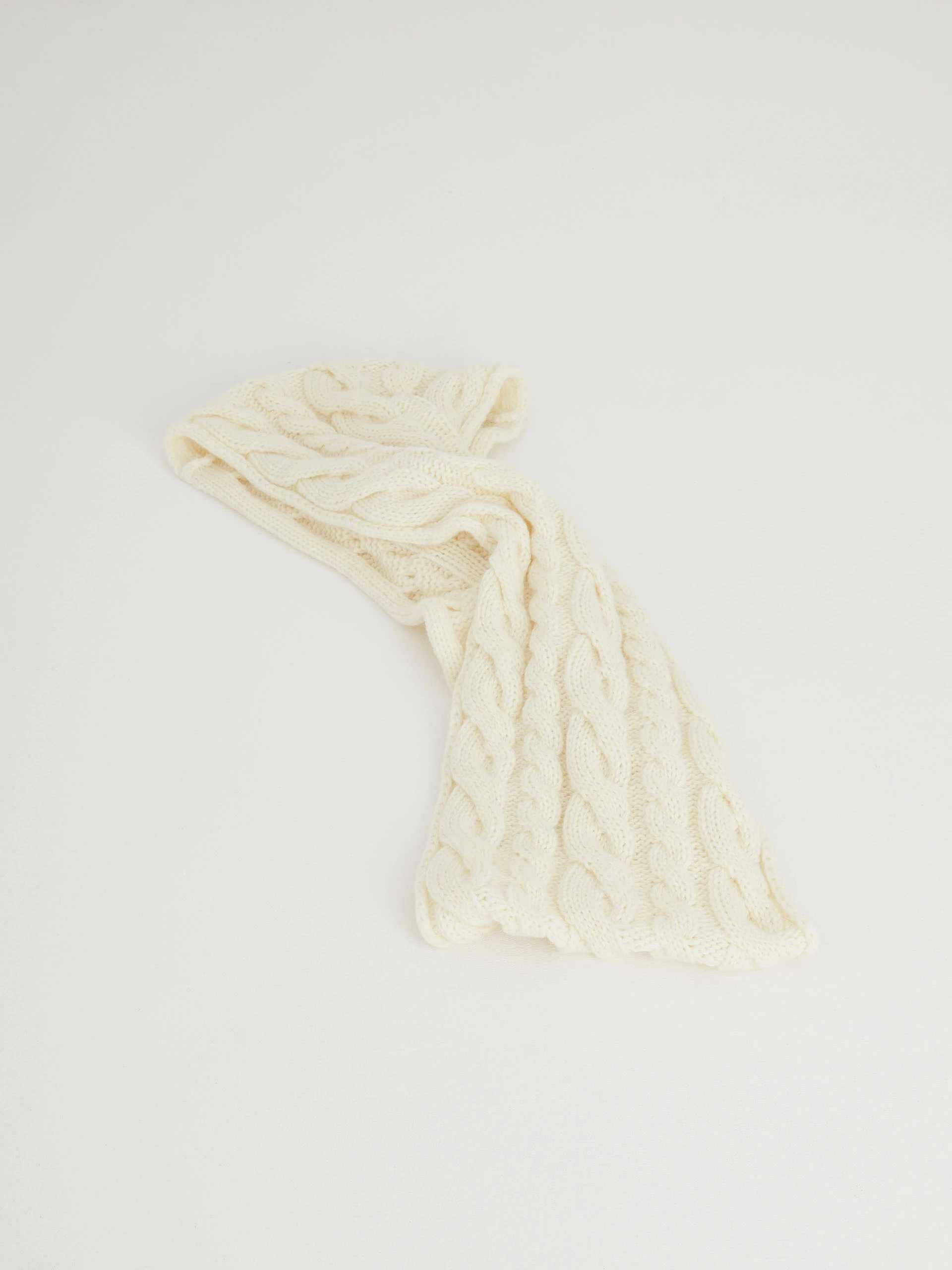 Long light-colored ribbed knit chimney shawl