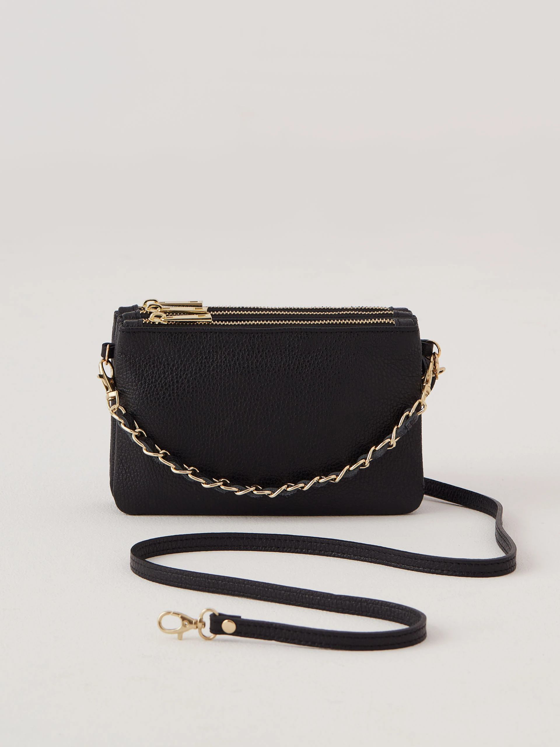 Black leather handbag on a long strap