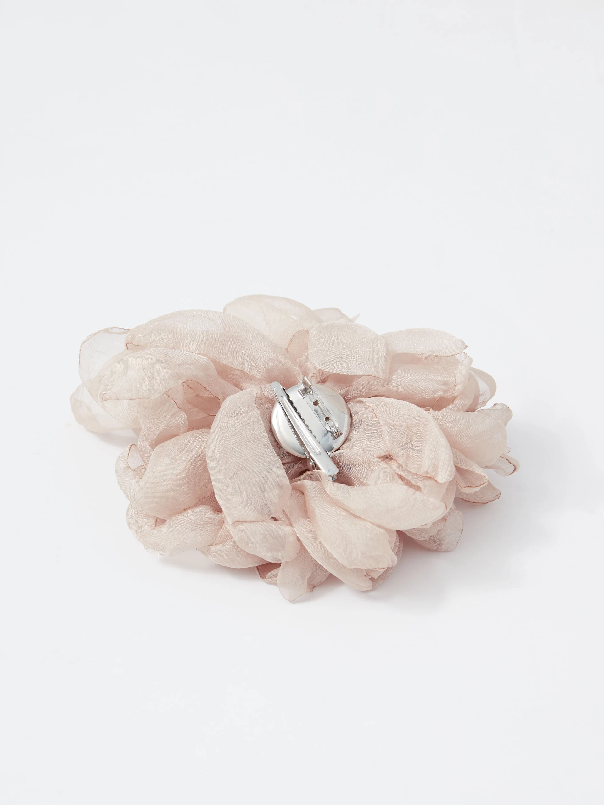 Large beige flower-shaped brooch and pin