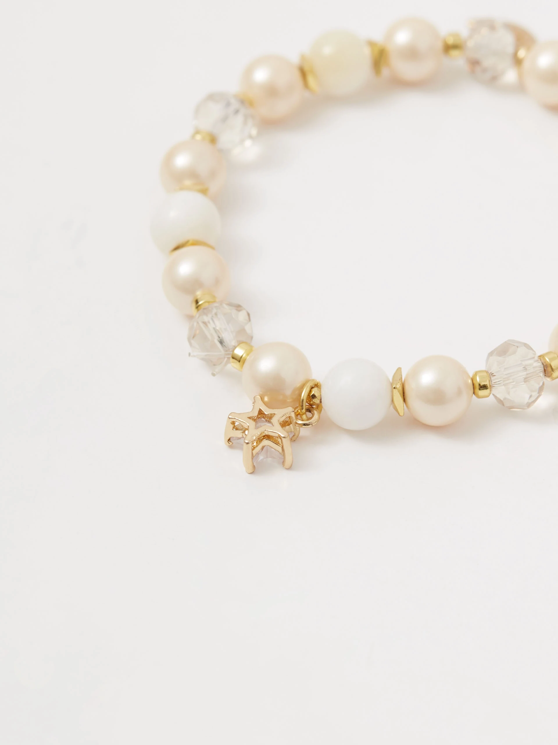 Gold-plated bracelet with natural stones