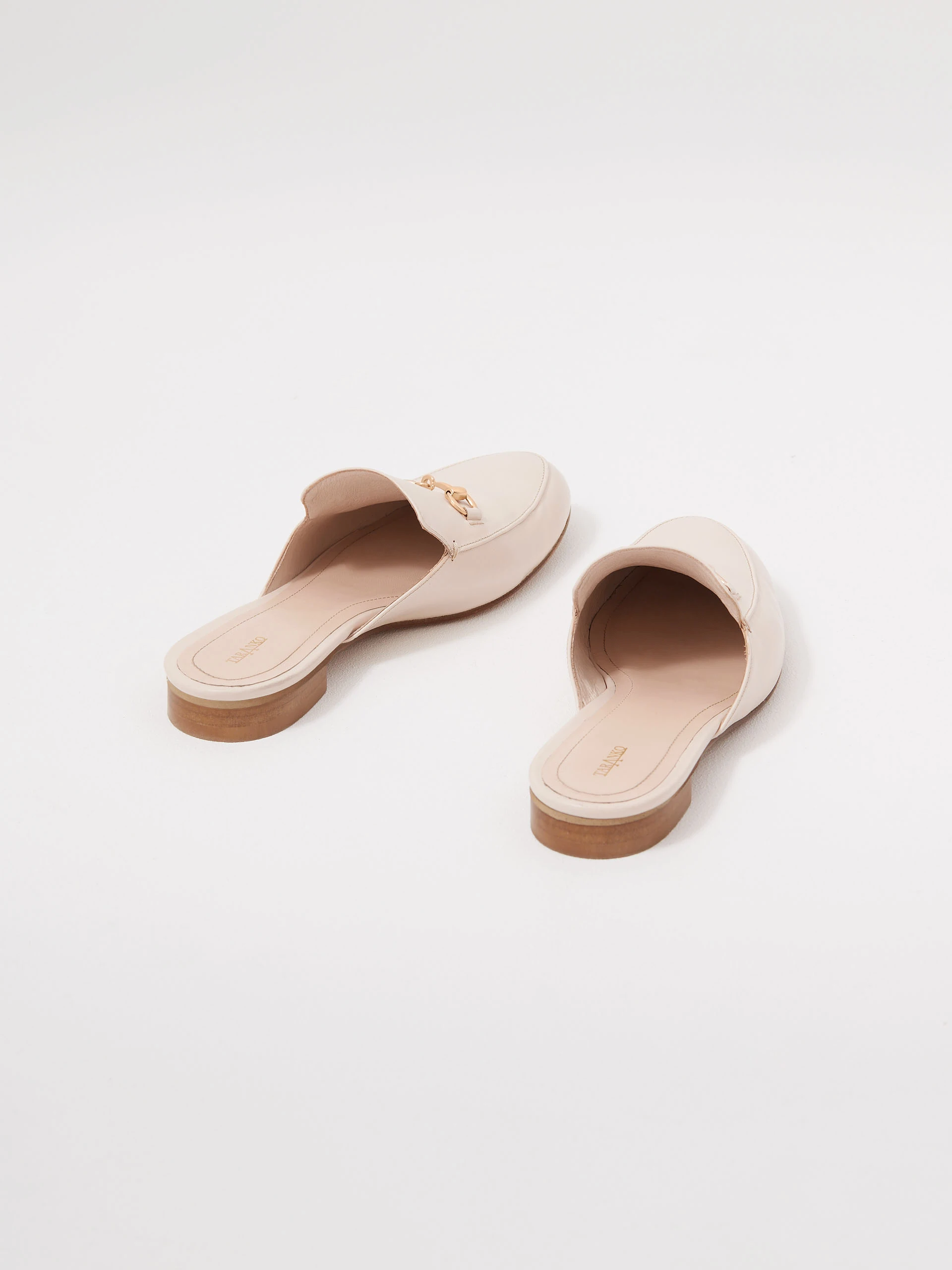 Beige leather moccasin-style flip-flops