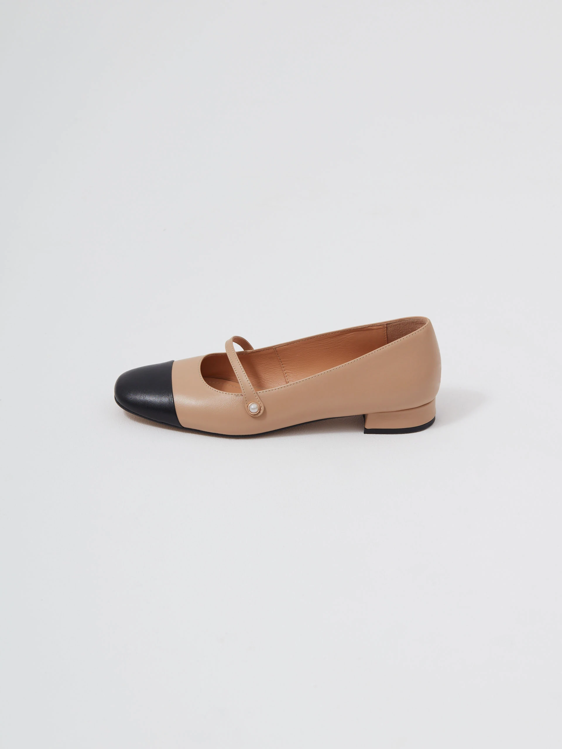 Beige leather Mary Jane pumps