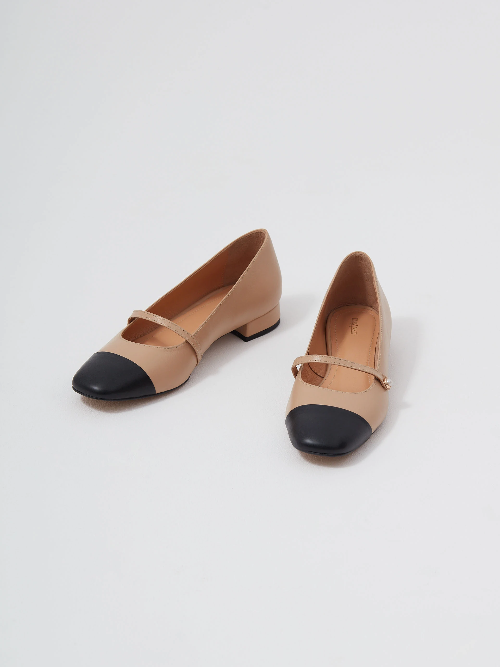 Beige leather Mary Jane pumps