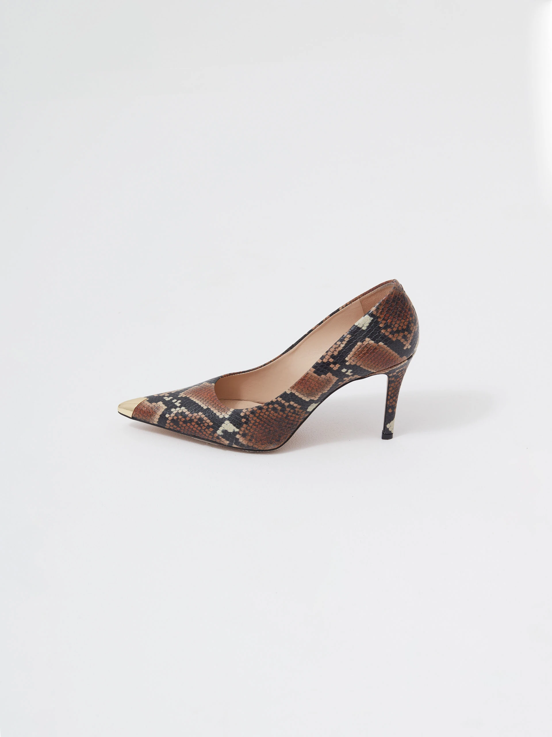 Leather pumps with animal skin motif