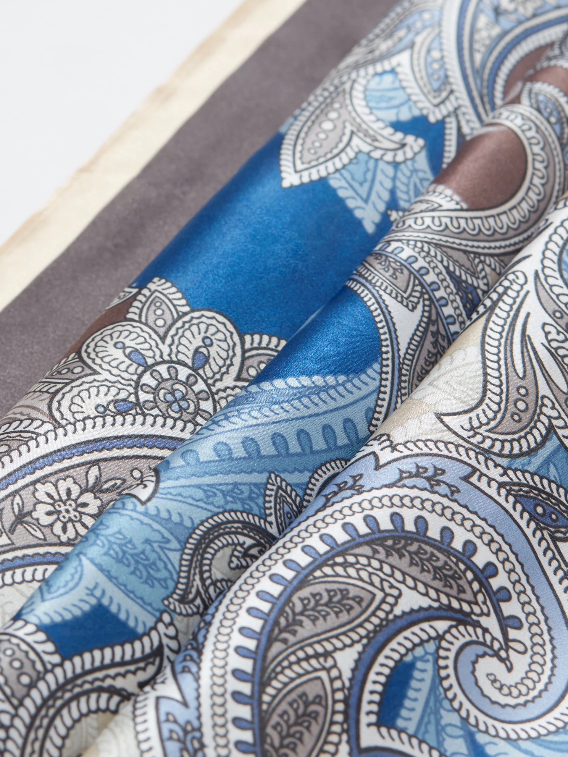 Silk scarf with paisley patterns