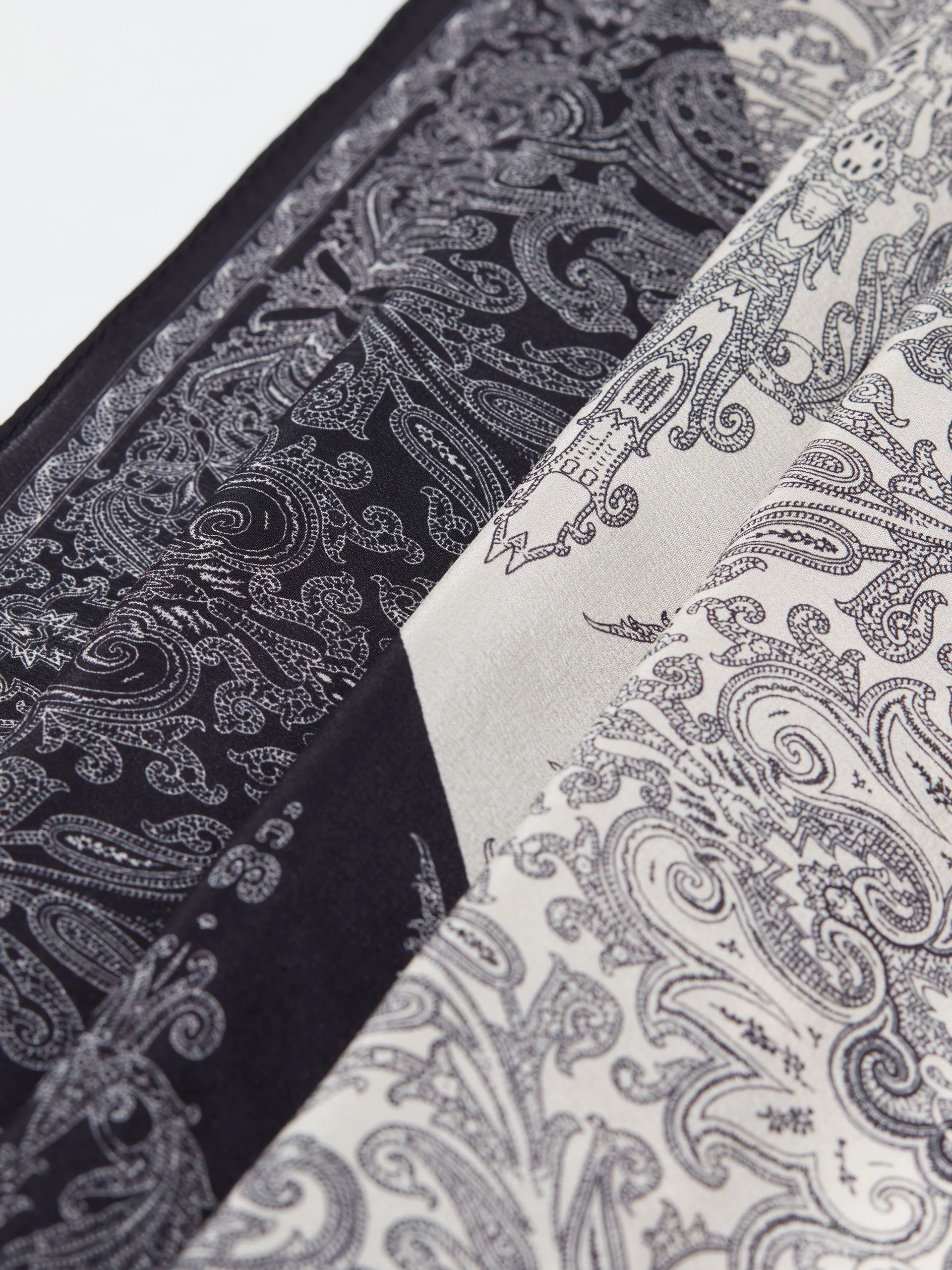 Black and white silk scarf with paisley patterns