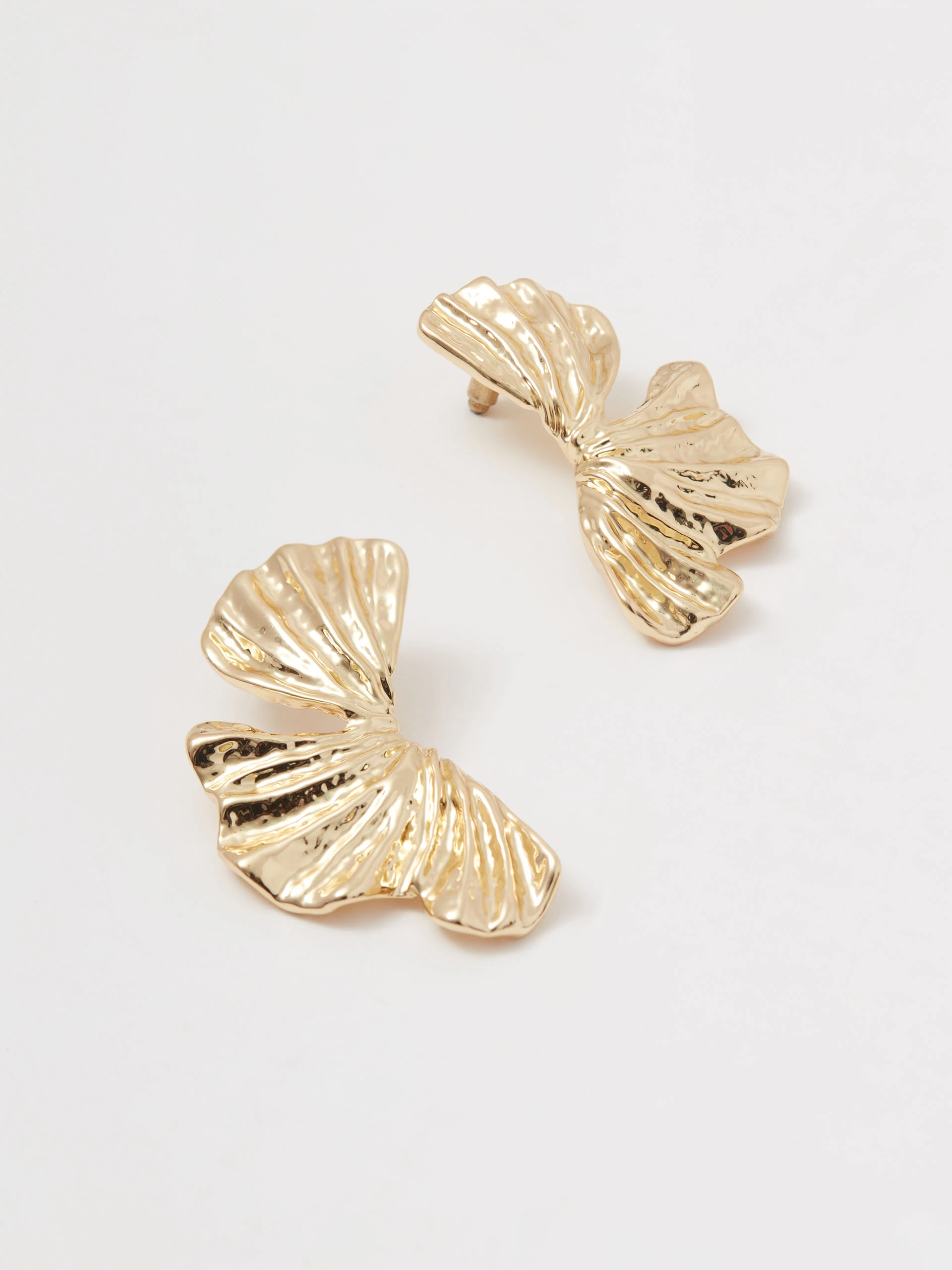 Gold-plated earrings with an irregular shape