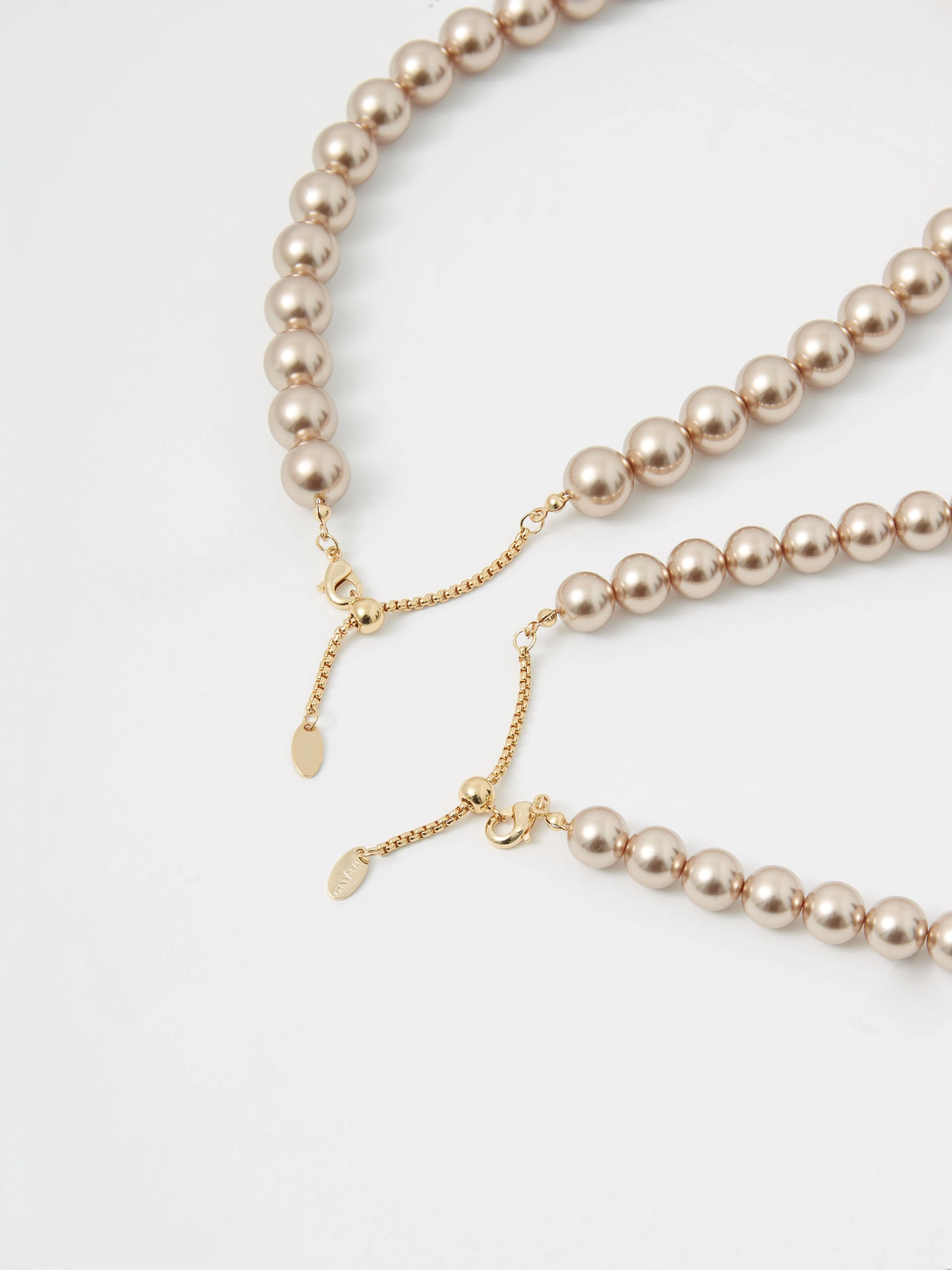 Set of two pink pearl necklaces