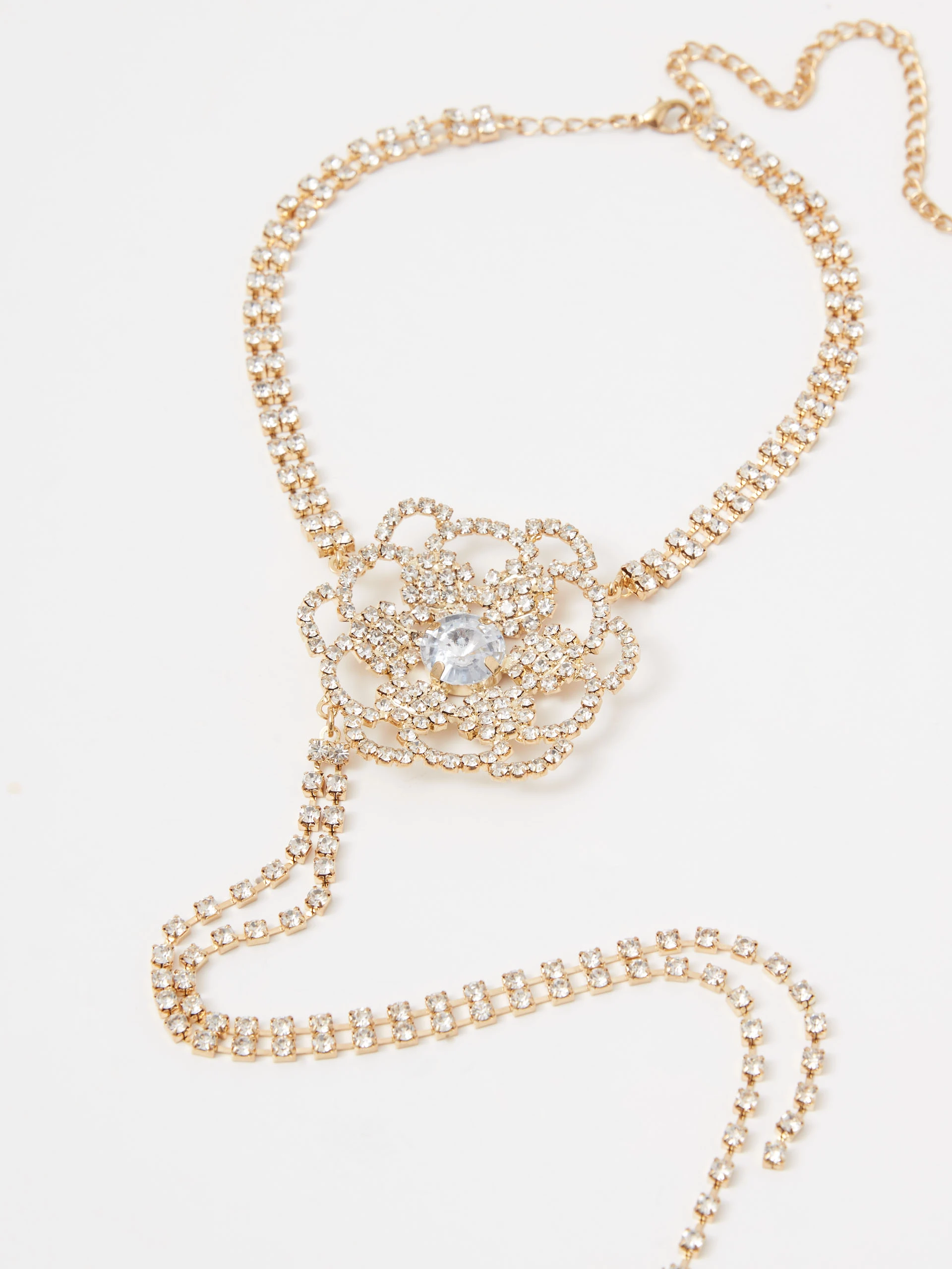 Gold-plated necklace with a large flower-shaped pendant