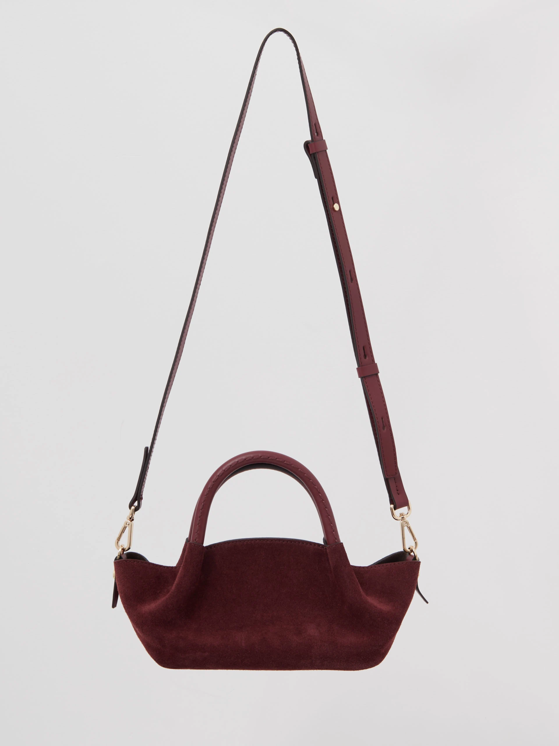 Suede handbag in burgundy